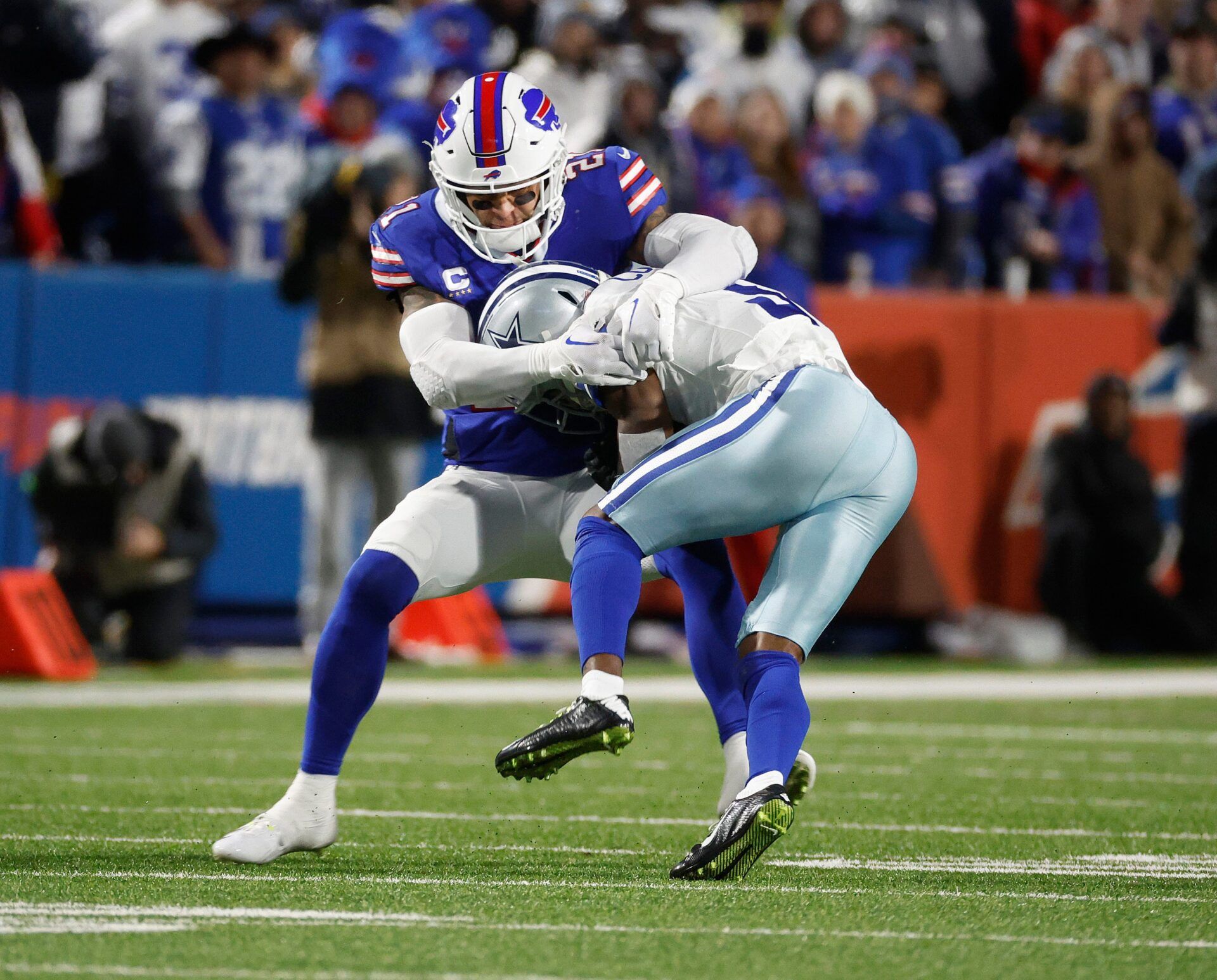 Buffalo Bills safety Jordan Poyer (21) makes a tackle on Dallas Cowboys wide receiver Brandin Cooks (3).