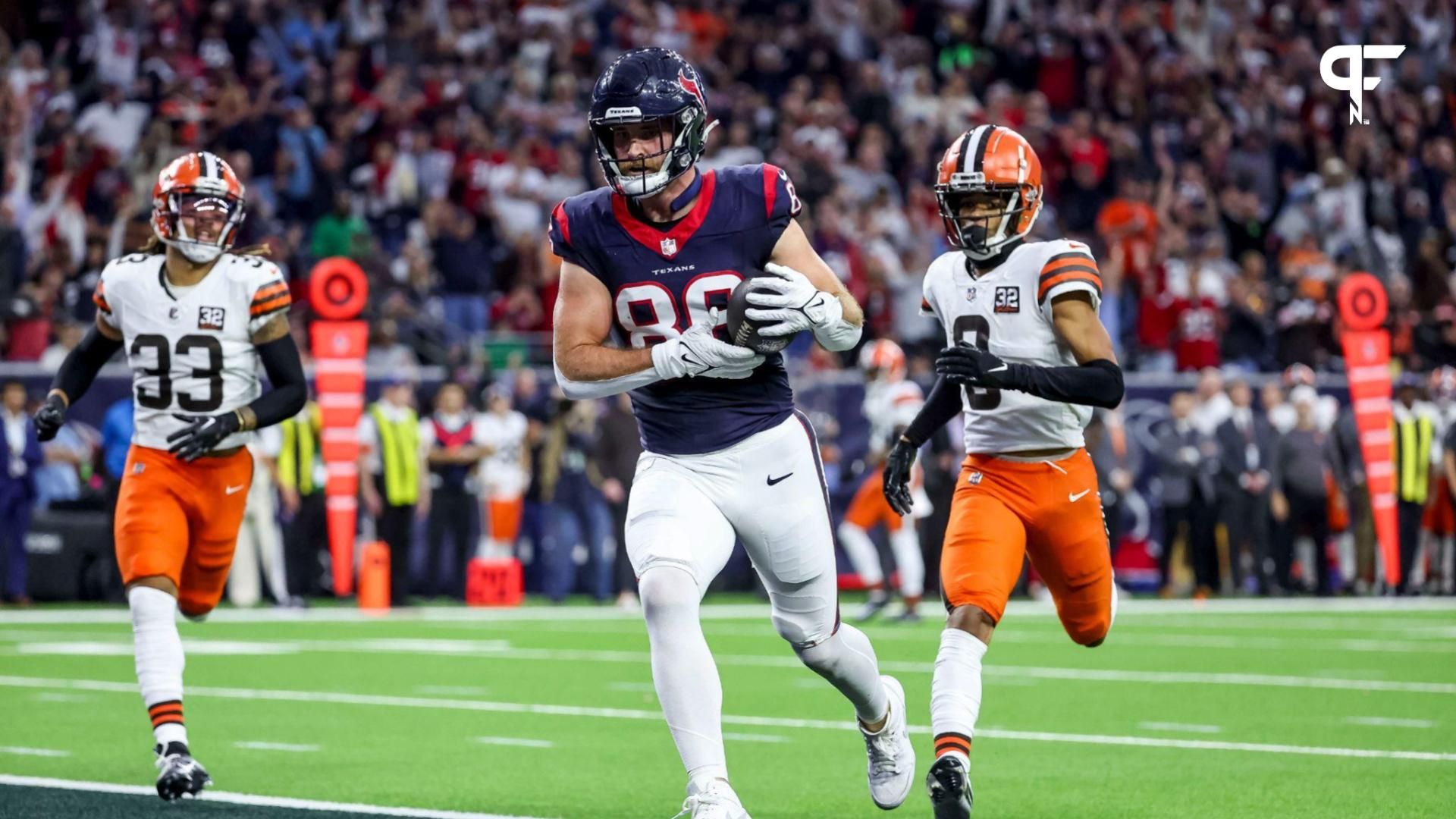 Houston Texans tight end Dalton Schultz (86) scores a touch down during the second quarter in a 2024 AFC wild card game at NRG Stadium.