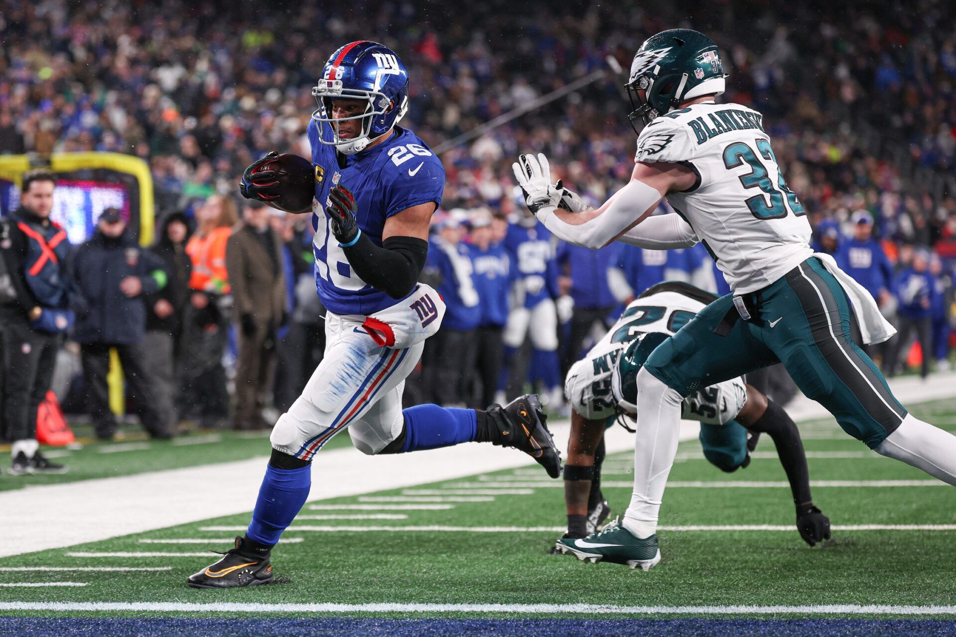 New York Giants RB Saquon Barkley (26) runs in for a touchdowna against the Philadelphia Eagles.