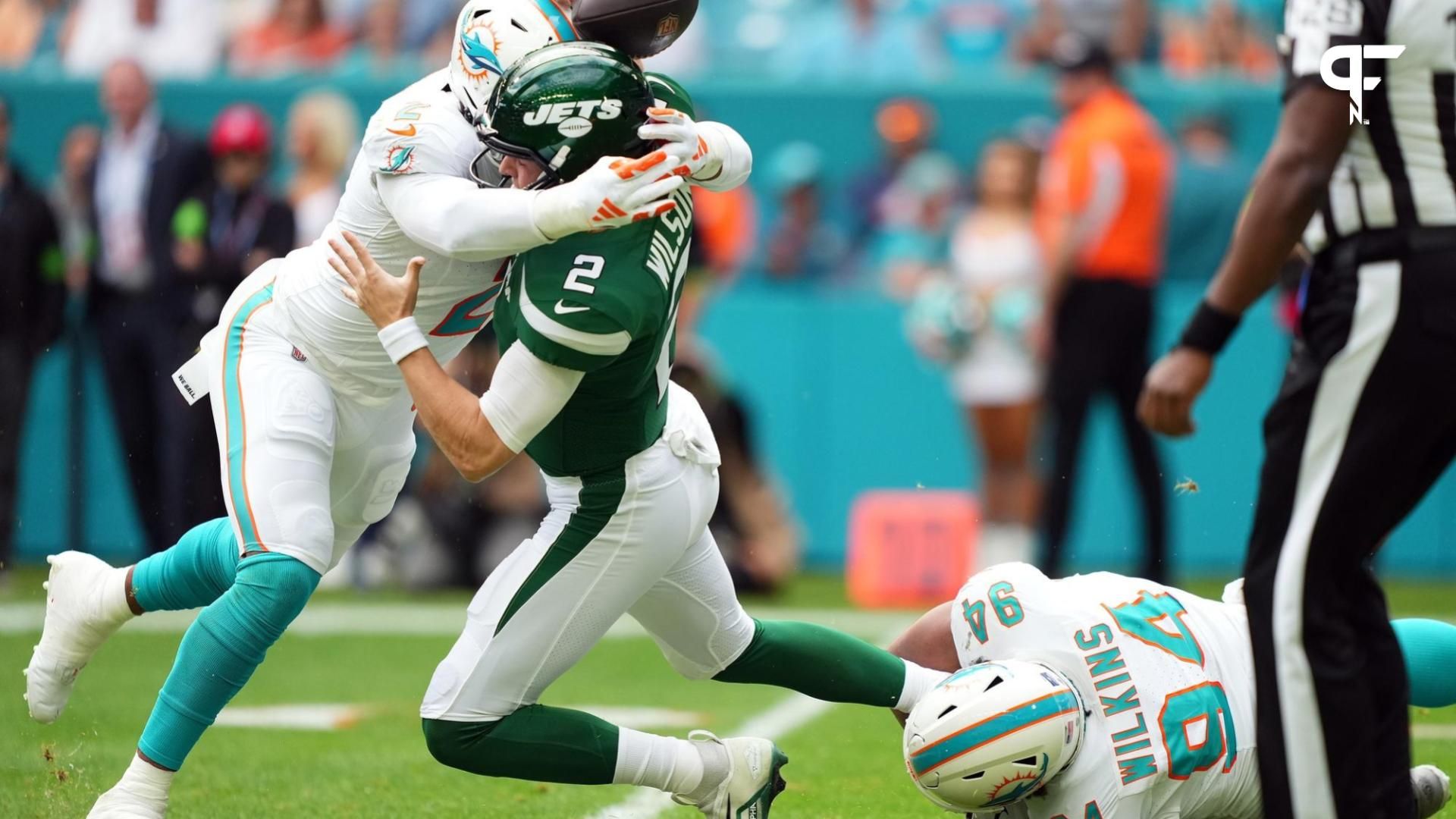 New York Jets QB Zach Wilson (2) is sacked and fumbles against the Miami Dolphins.