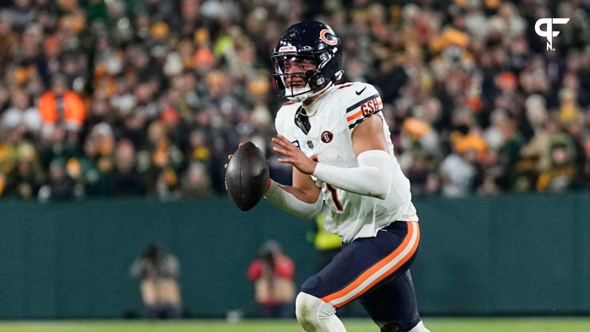 Chicago Bears quarterback Justin Fields (1) looks to throw a pass during the fourth quarter against the Green Bay Packers at Lambeau Field.