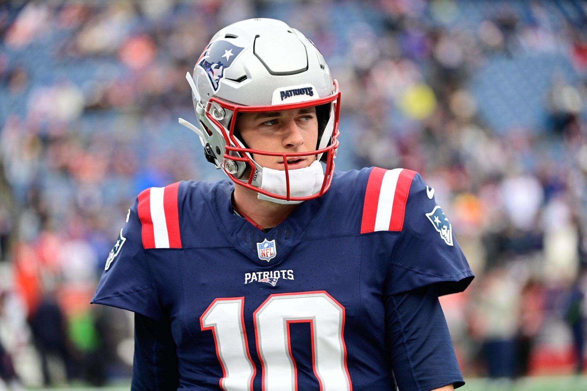 Dec 17, 2023; Foxborough, Massachusetts, USA; New England Patriots quarterback Mac Jones (10) warms up before a game against the Kansas City Chiefs at Gillette Stadium. Mandatory Credit: Eric Canha-USA TODAY Sports