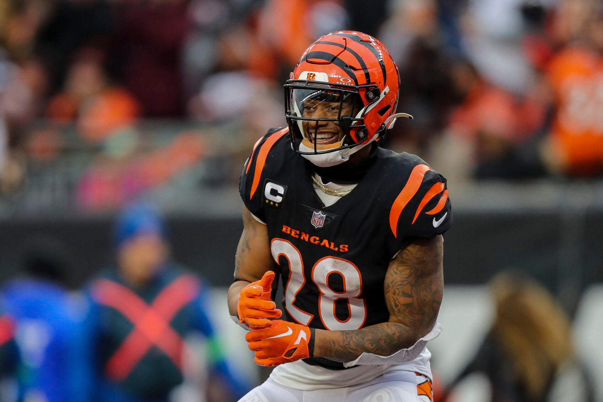 Cincinnati Bengals running back Joe Mixon (28) reacts after wide receiver Andrei Iosivas (not pictured) scored a touchdown against the Cleveland Browns in the second half at Paycor Stadium.