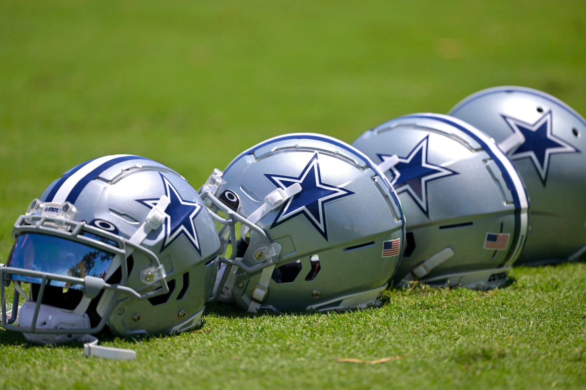 General view of player helmets on the field during training camp at River Ridge Playing Fields in Oxnard, CA.