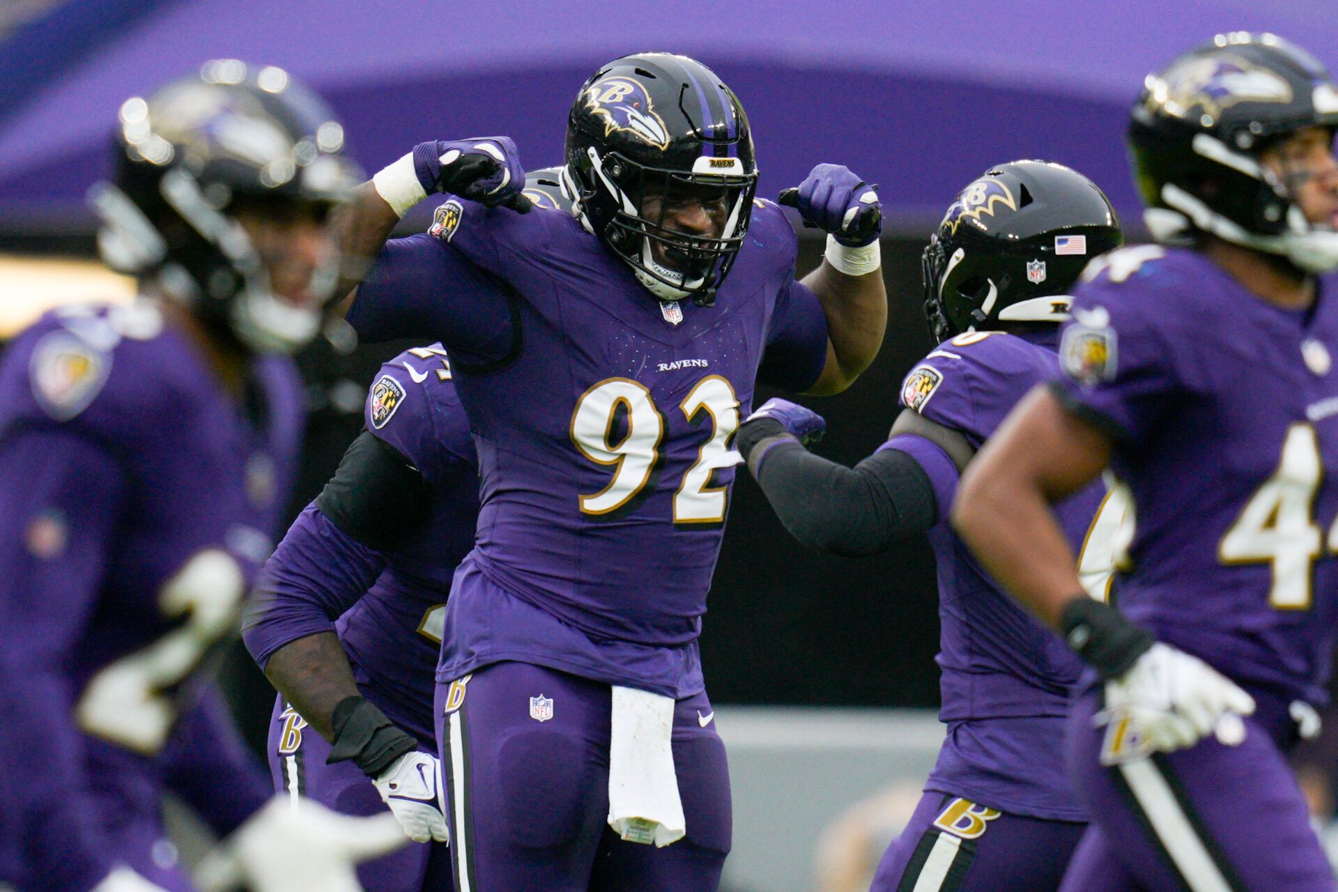 Baltimore Ravens defensive tackle Justin Madubuike (92) celebrates a sack against the Los Angeles Rams during the first quarter at M&T Bank Stadium.