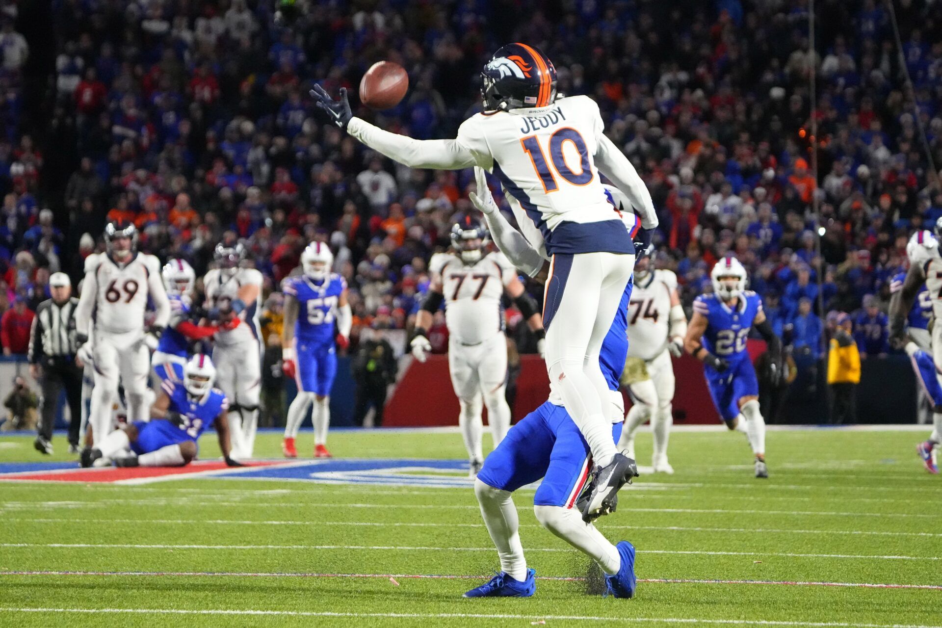 Buffalo Bills cornerback Taron Johnson (7) pushes Denver Broncos wide receiver Jerry Jeudy (10) attempting to make a catch and is called for pass interference during the second half at Highmark Stadium.