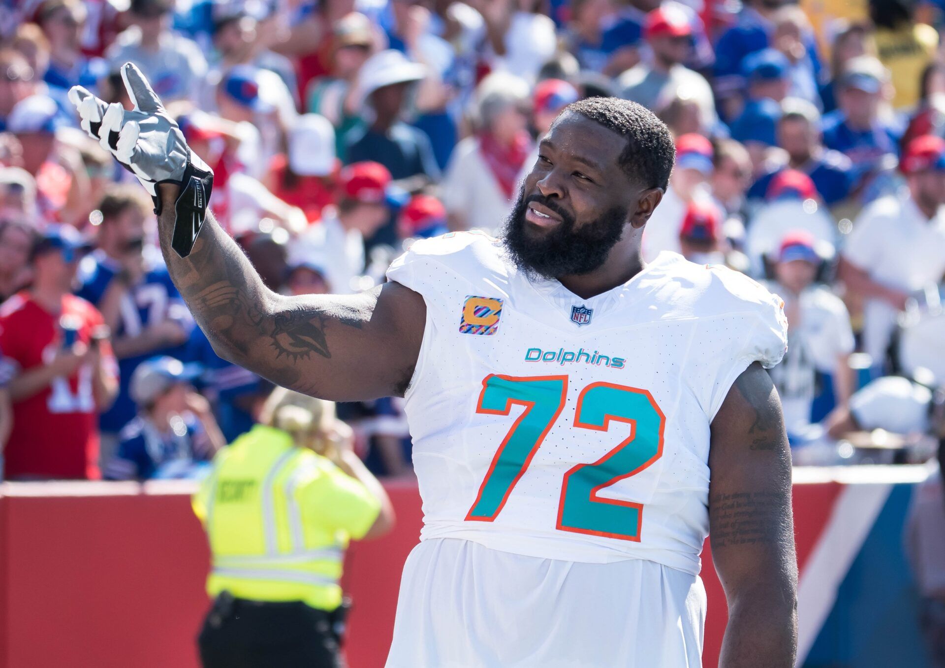 Miami Dolphins offensive tackle Terron Armstead (72) reacts to the crowd before a game against the Buffalo Bills at Highmark Stadium.