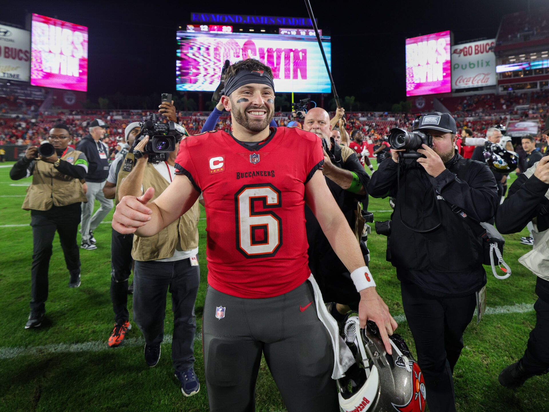 Tampa Bay Buccaneers quarterback Baker Mayfield (6) celebrates after beating the Jacksonville Jaguars at Raymond James Stadium.