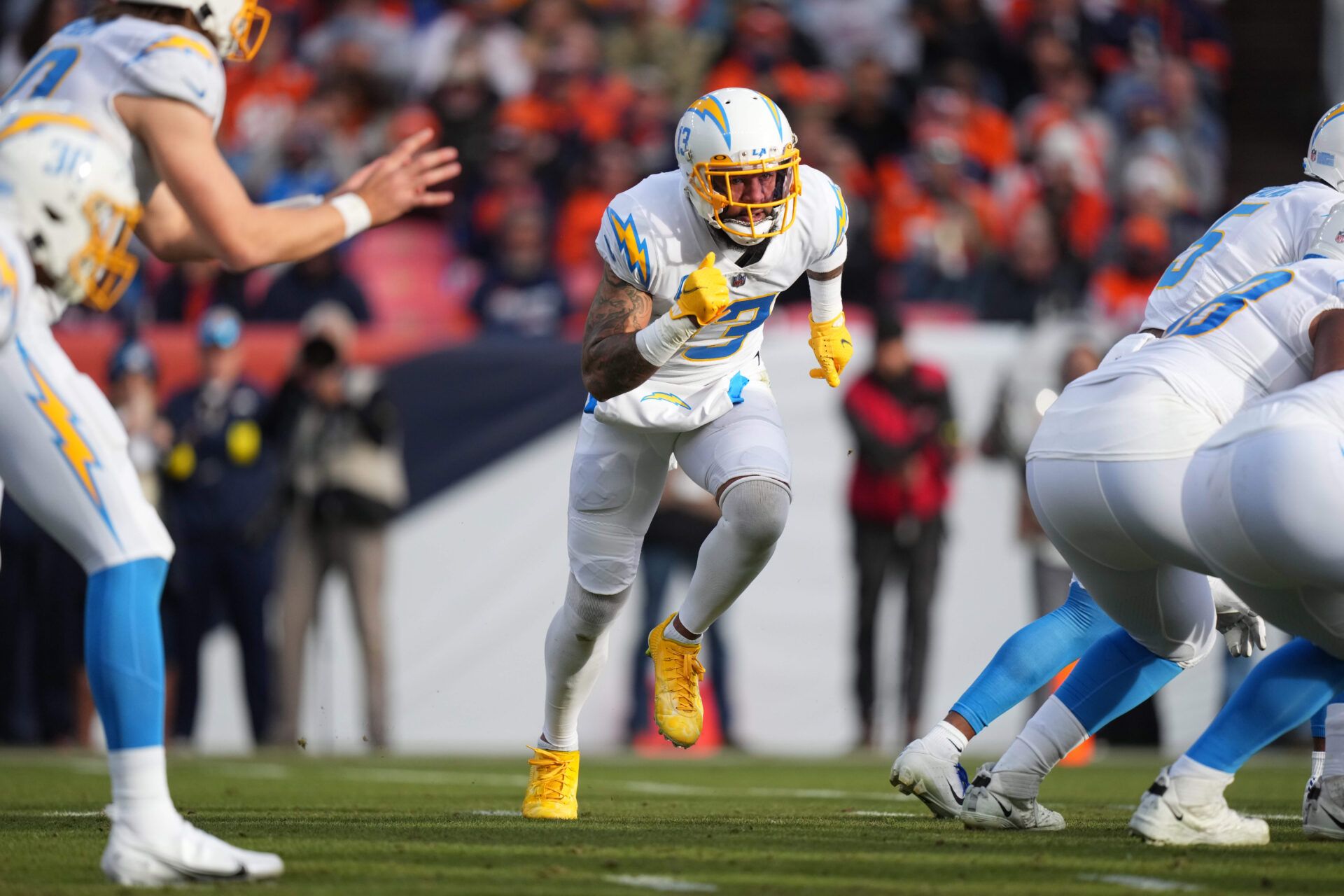 Los Angeles Chargers wide receiver Keenan Allen (13) runs a route against the Denver Broncos in the first quarter at Empower Field at Mile High.