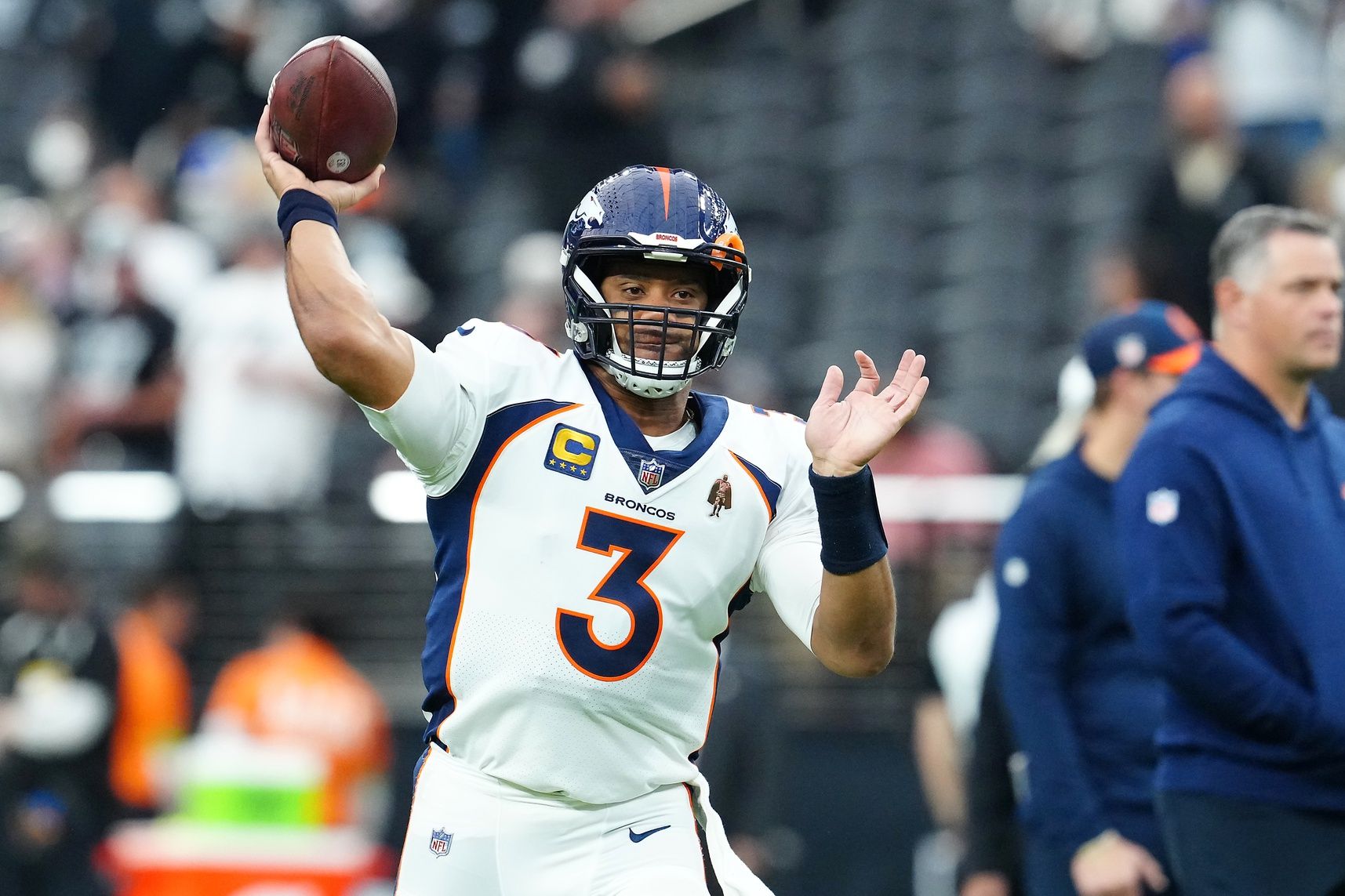 Denver Broncos quarterback Russell Wilson (3) warms up before a game against the Las Vegas Raiders at Allegiant Stadium.