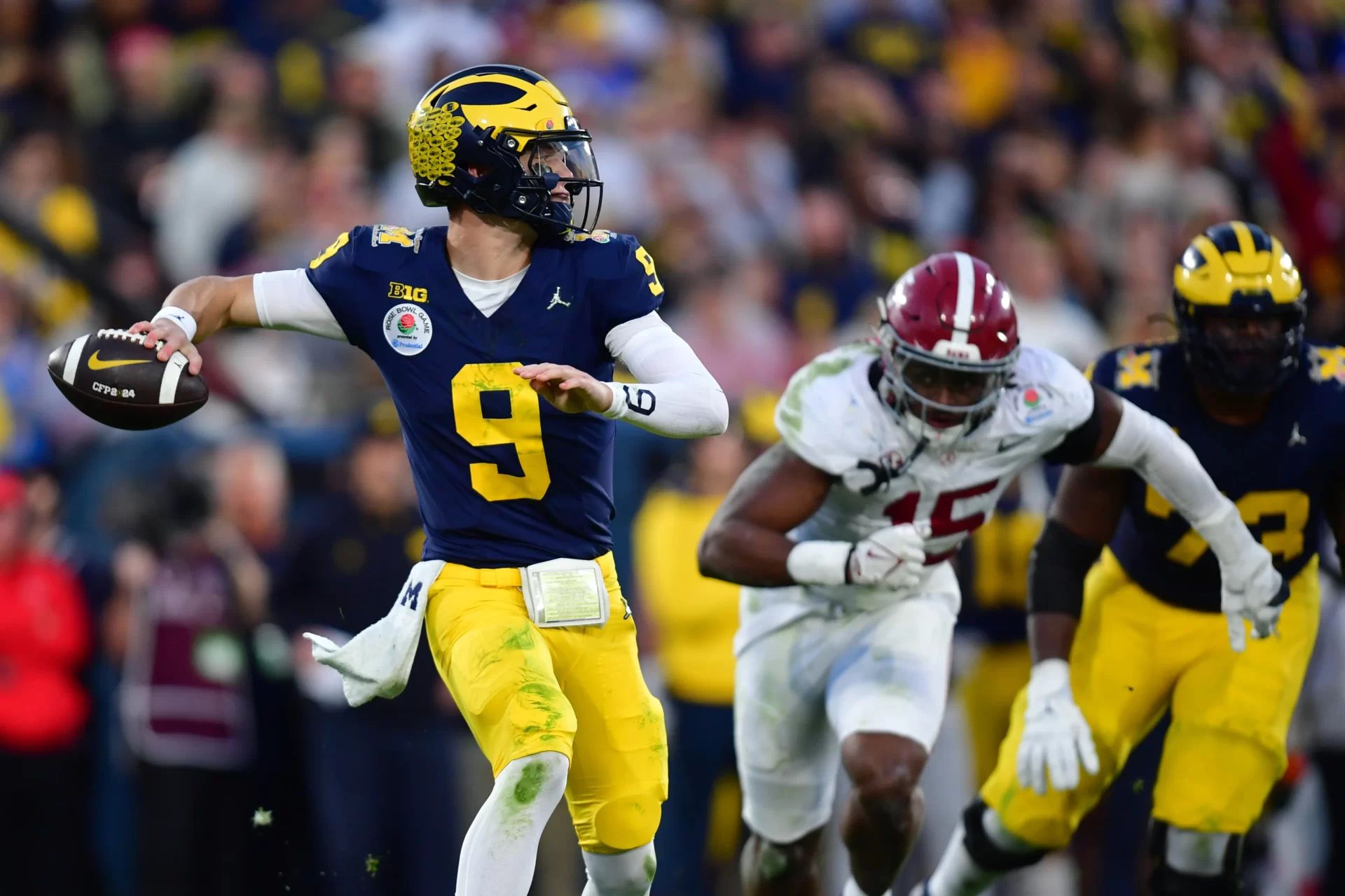 Michigan Wolverines QB J.J. McCarthy (9) throws a pass against Alabama.