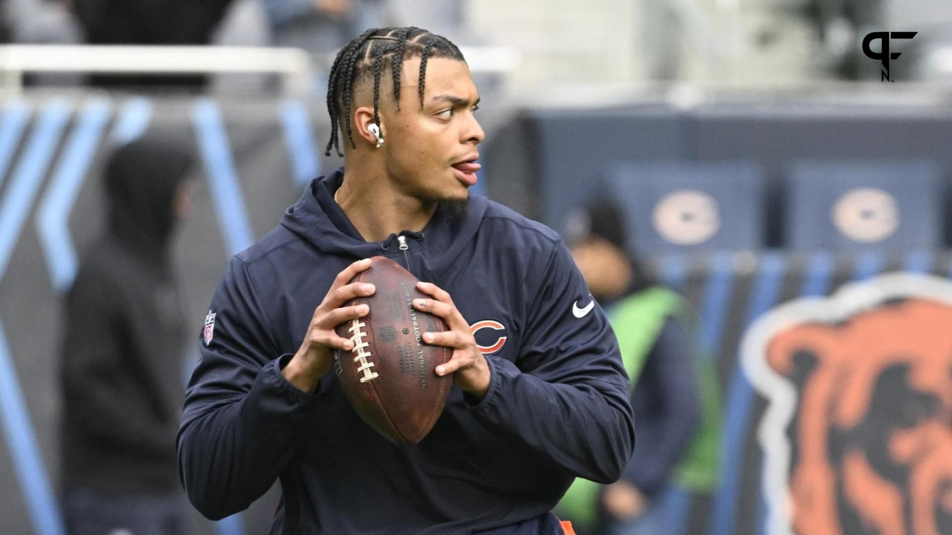 Chicago Bears quarterback Justin Fields (1) warms up before the team s game against the Arizona Cardinals at Soldier Field.