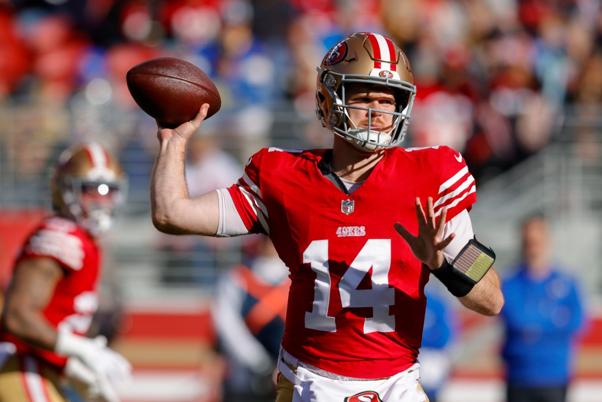 San Francisco 49ers quarterback Sam Darnold (14) throws a pass during the first quarter against the Los Angeles Rams at Levi's Stadium.