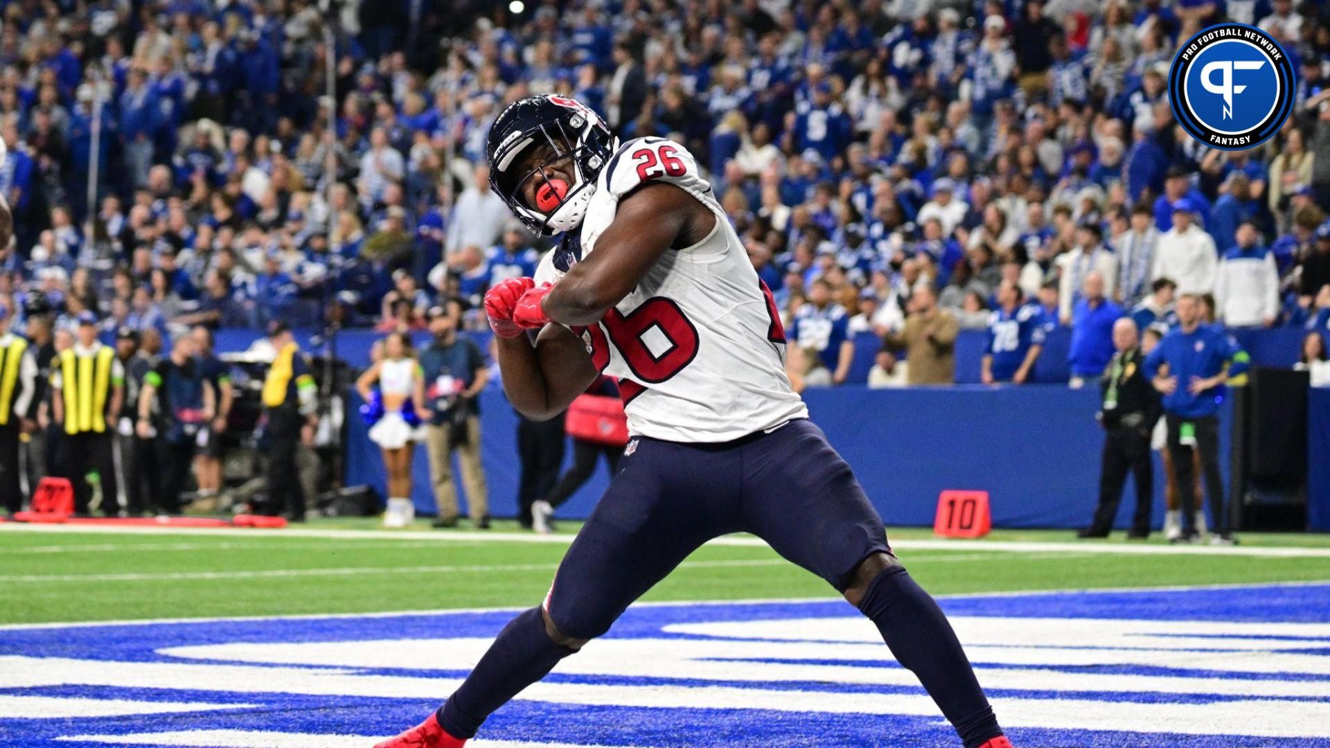 Houston Texans running back Devin Singletary (26) celebrates after a touchdown against the Indianapolis Colts during the second half at Lucas Oil Stadium.