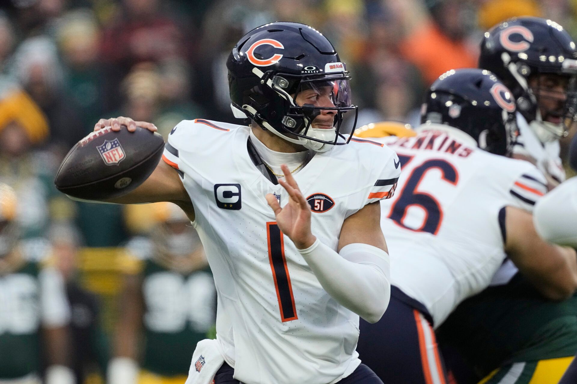 Jan 7, 2024; Green Bay, Wisconsin, USA; Chicago Bears quarterback Justin Fields (1) throws a pass during the first quarter against the Green Bay Packers at Lambeau Field. Mandatory Credit: Jeff Hanisch-USA TODAY Sports