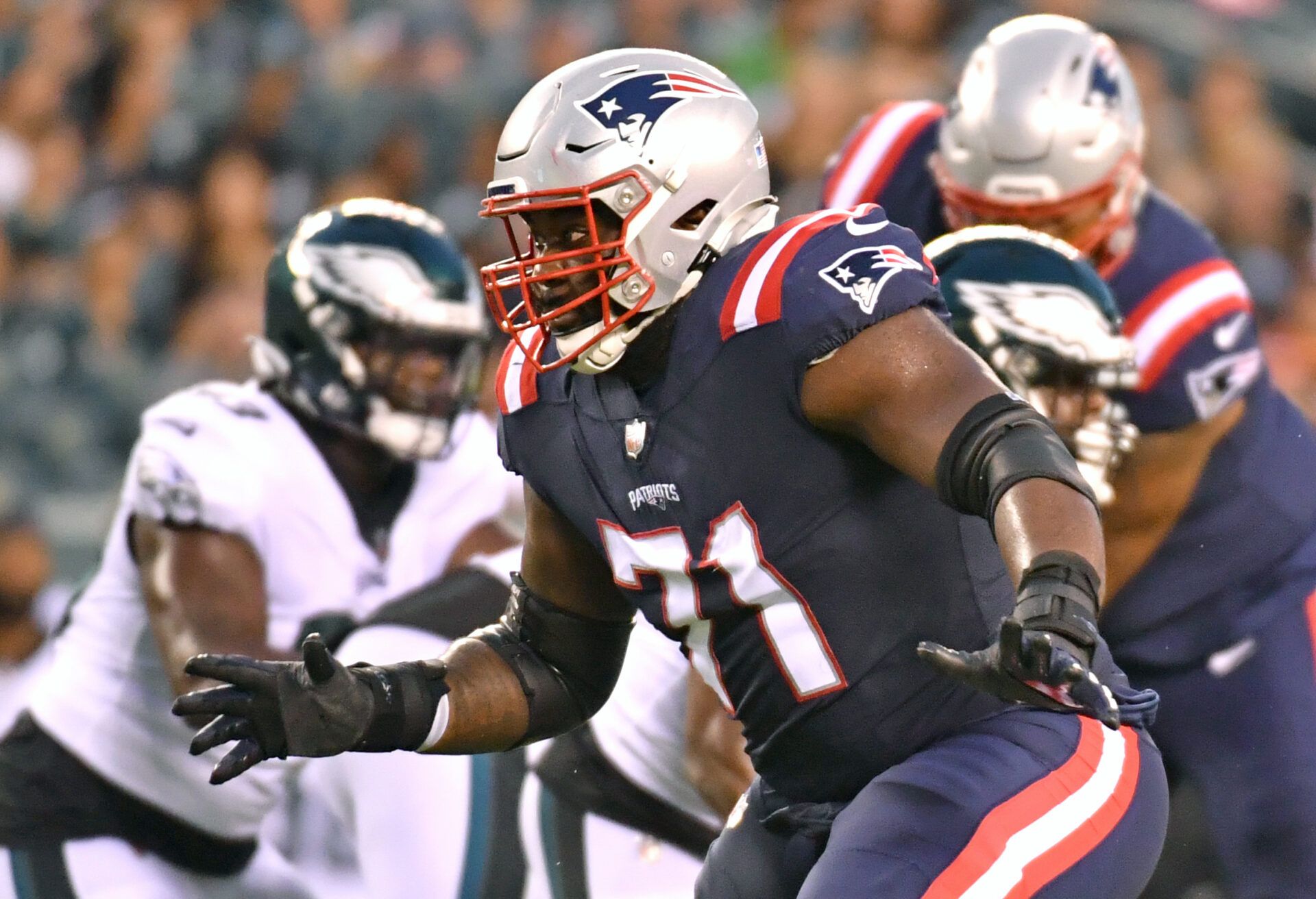 New England Patriots offensive guard Mike Onwenu (71) blocks against the Philadelphia Eagles at Lincoln Financial Field.