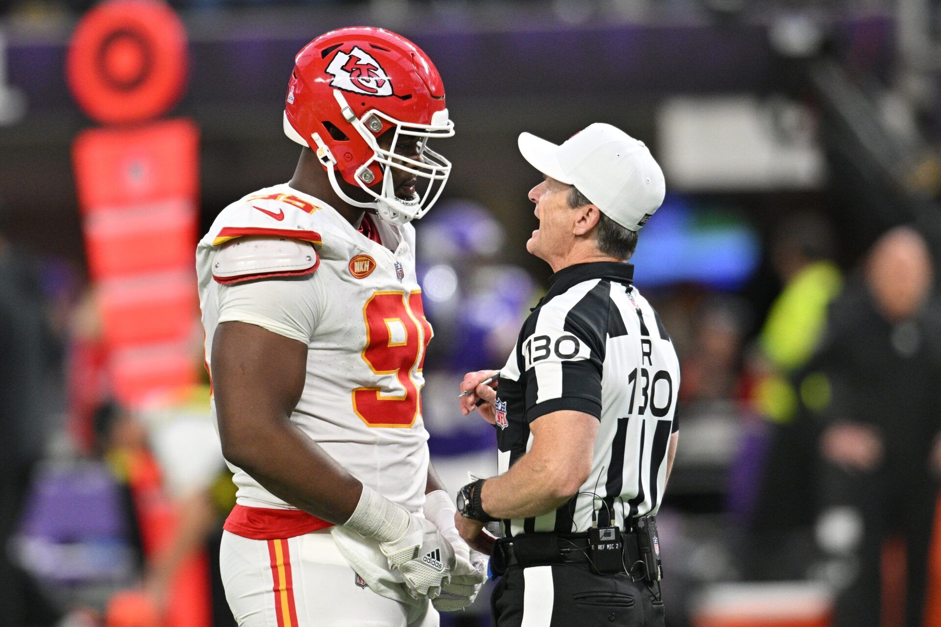 Kansas City Chiefs defensive tackle Chris Jones (95) talks with an official during the fourth quarter against the Minnesota Vikings at U.S. Bank Stadium.