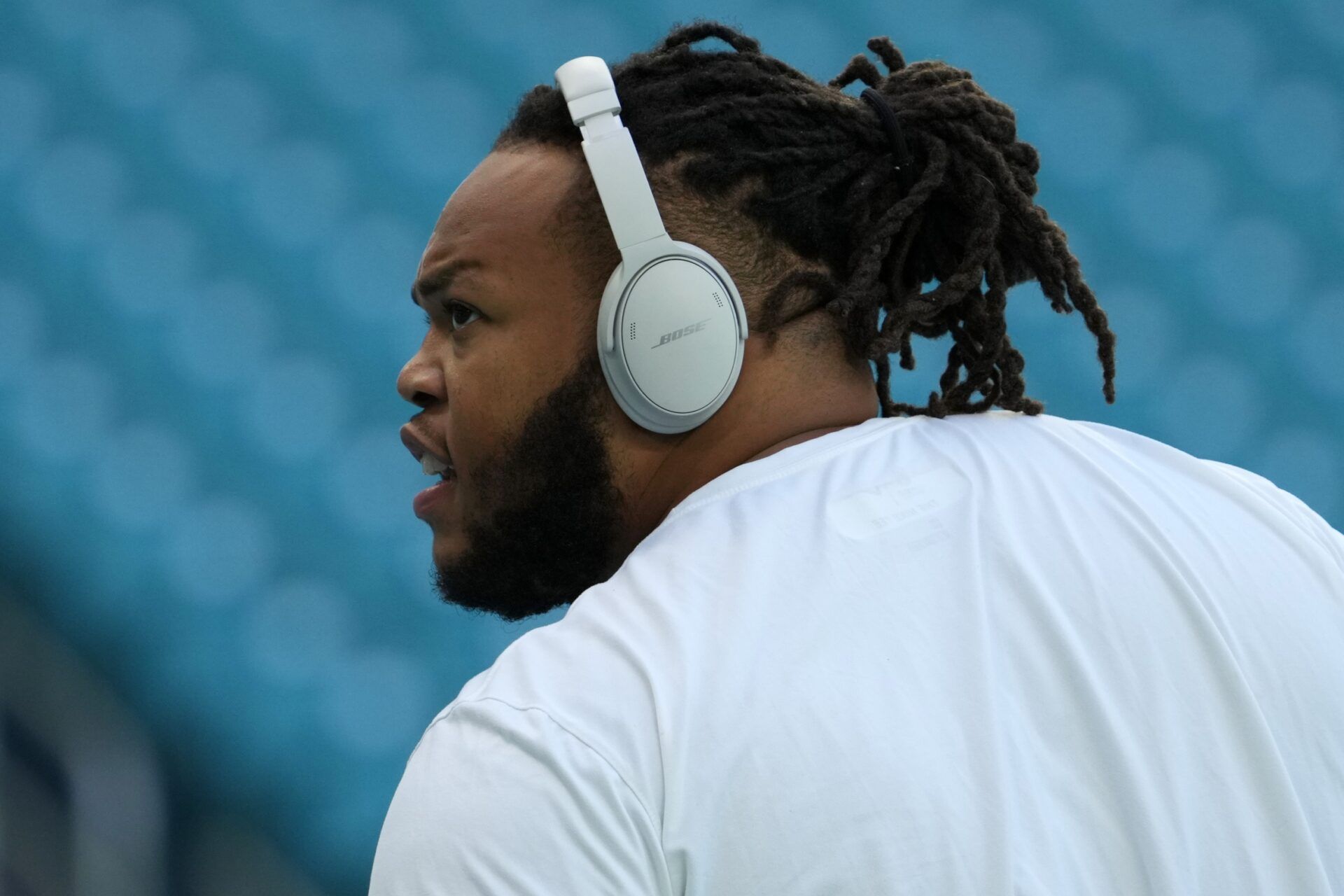 Miami Dolphins guard Robert Hunt warms up prior to the game against the Carolina Panthers at Hard Rock Stadium.