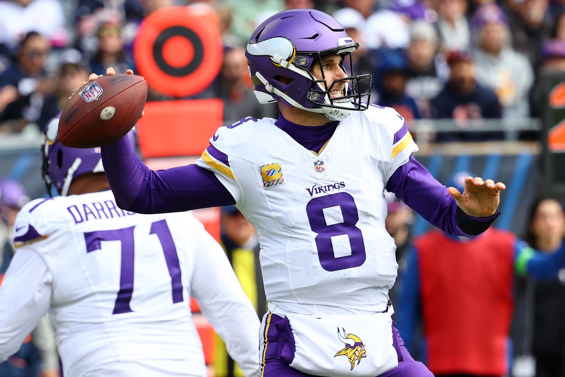 Minnesota Vikings quarterback Kirk Cousins (8) drops back to pass against the Chicago Bears during the first half at Soldier Field.
