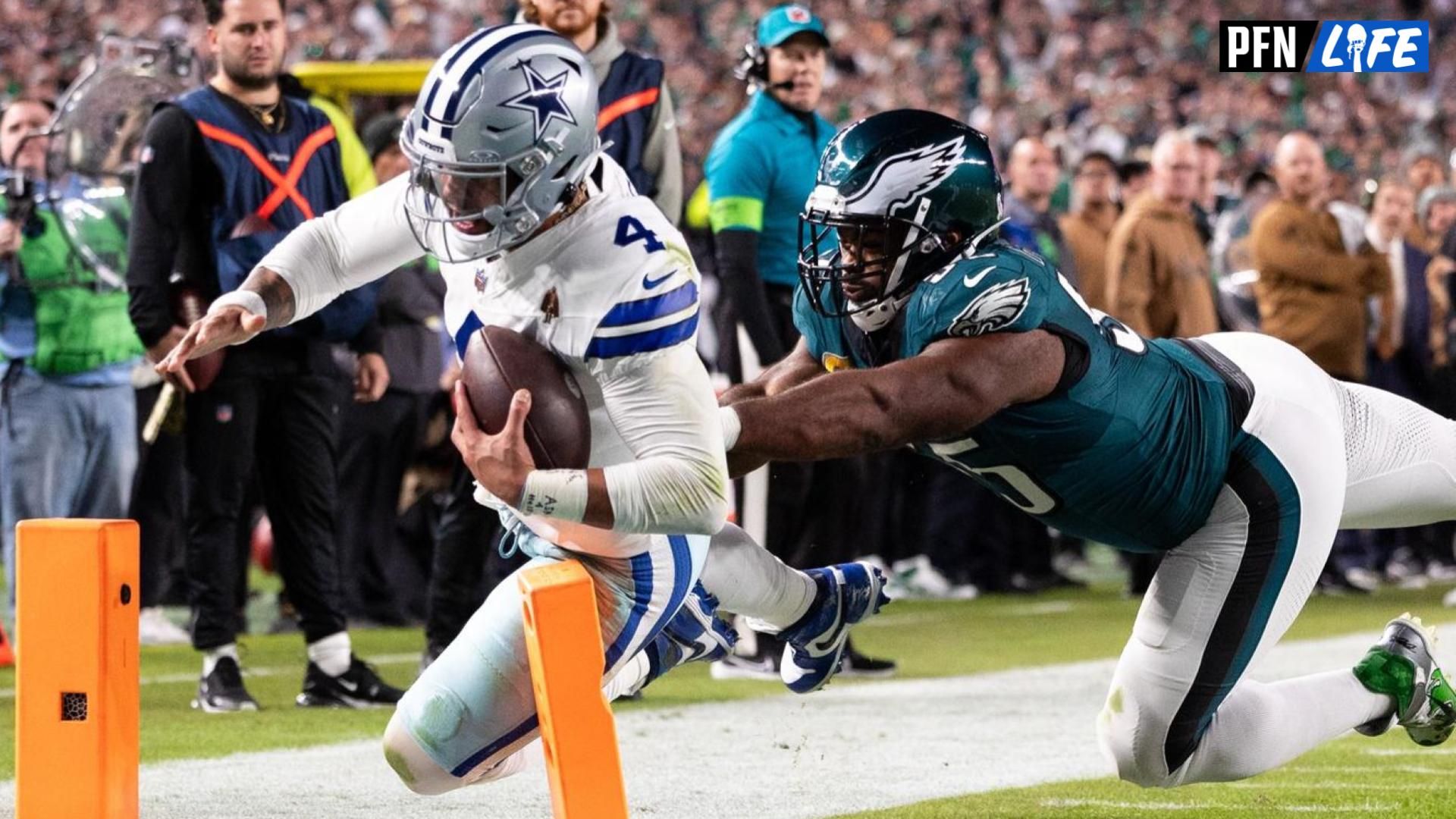 Philadelphia Eagles defensive end Brandon Graham (55) pushes Dallas Cowboys quarterback Dak Prescott (4) out of bounds short of a two point conversion during the fourth quarter at Lincoln Financial Field.