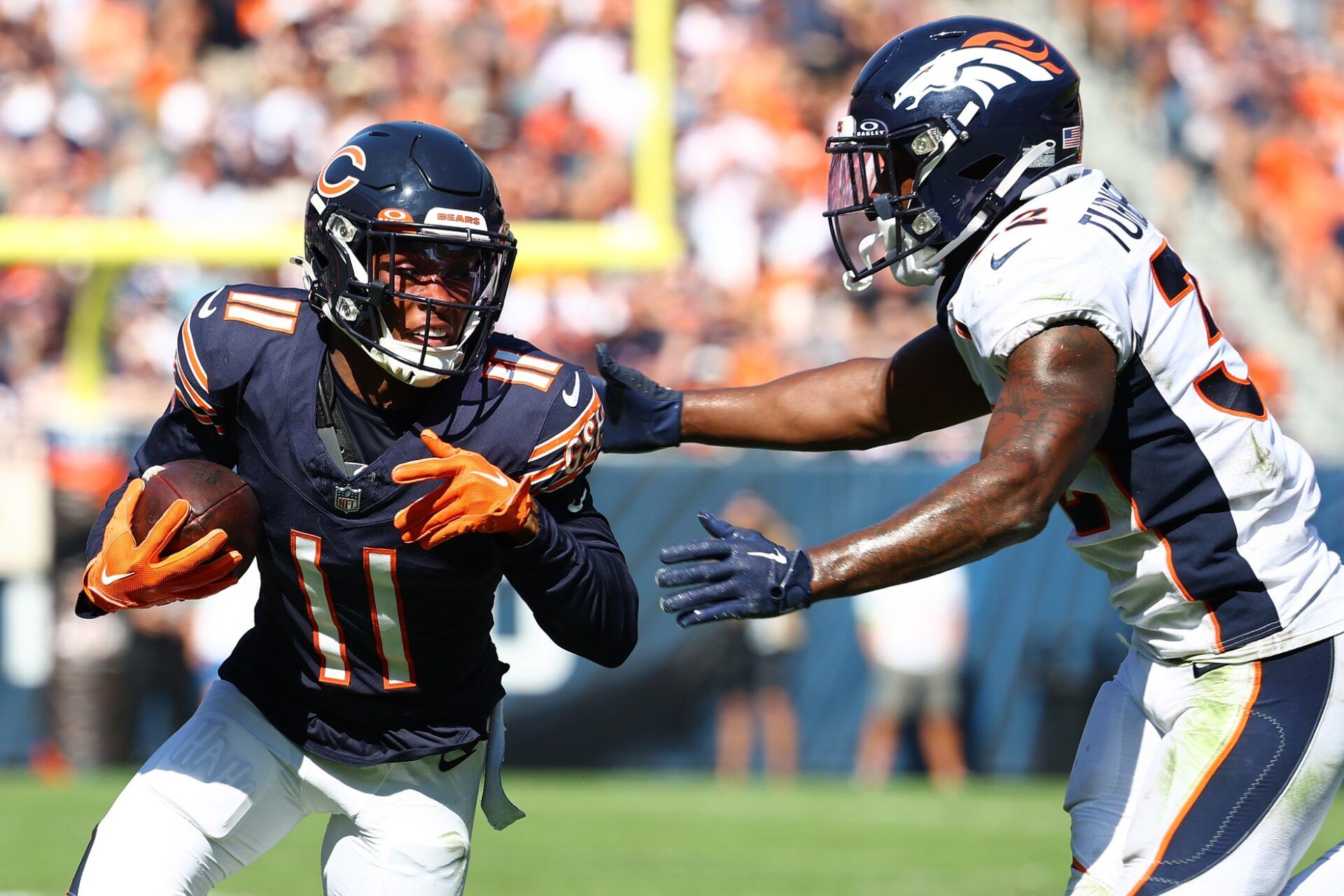 Chicago Bears WR Darnell Mooney (11) runs after the catch against the Denver Broncos.