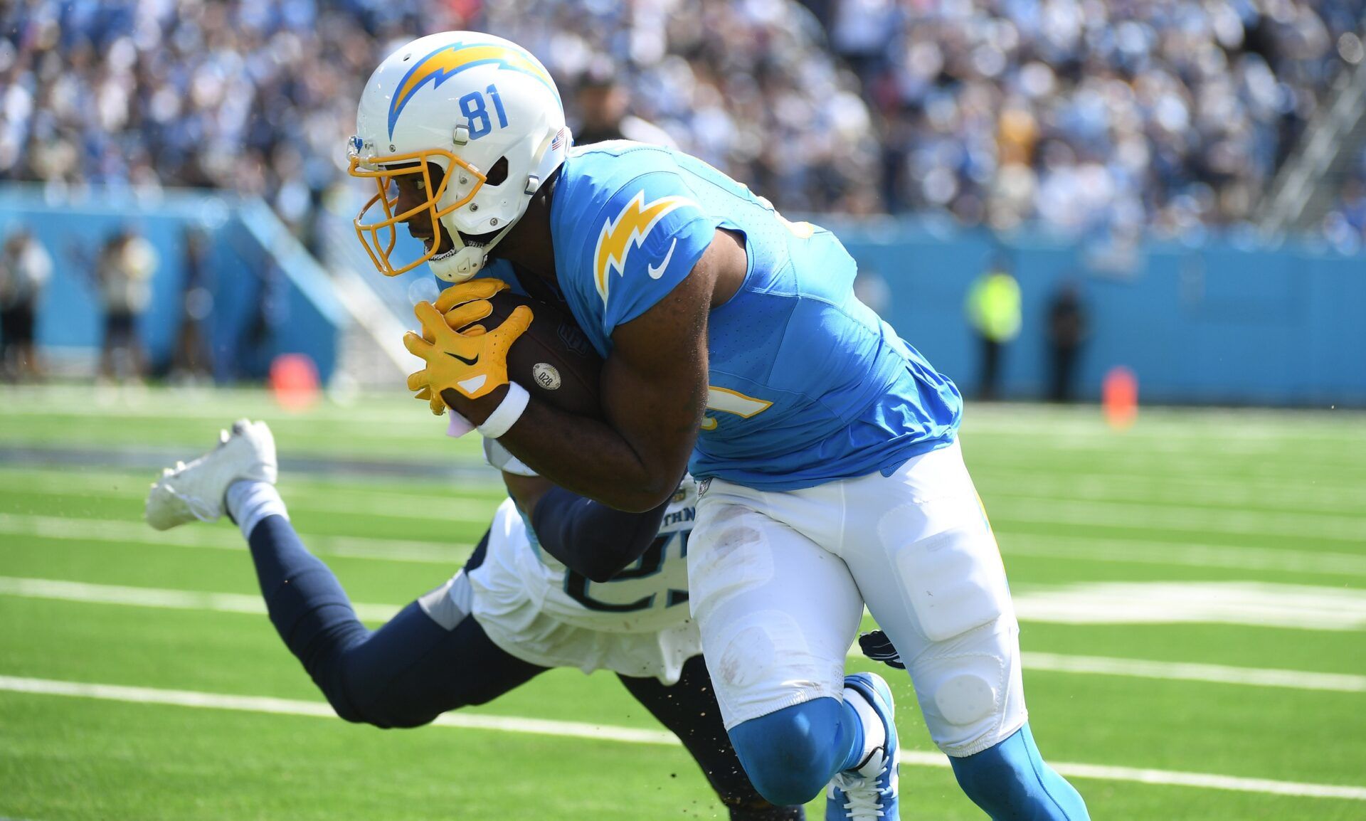 Los Angeles Chargers WR Mike Williams (81) tries to break free against the Tennessee Titans.