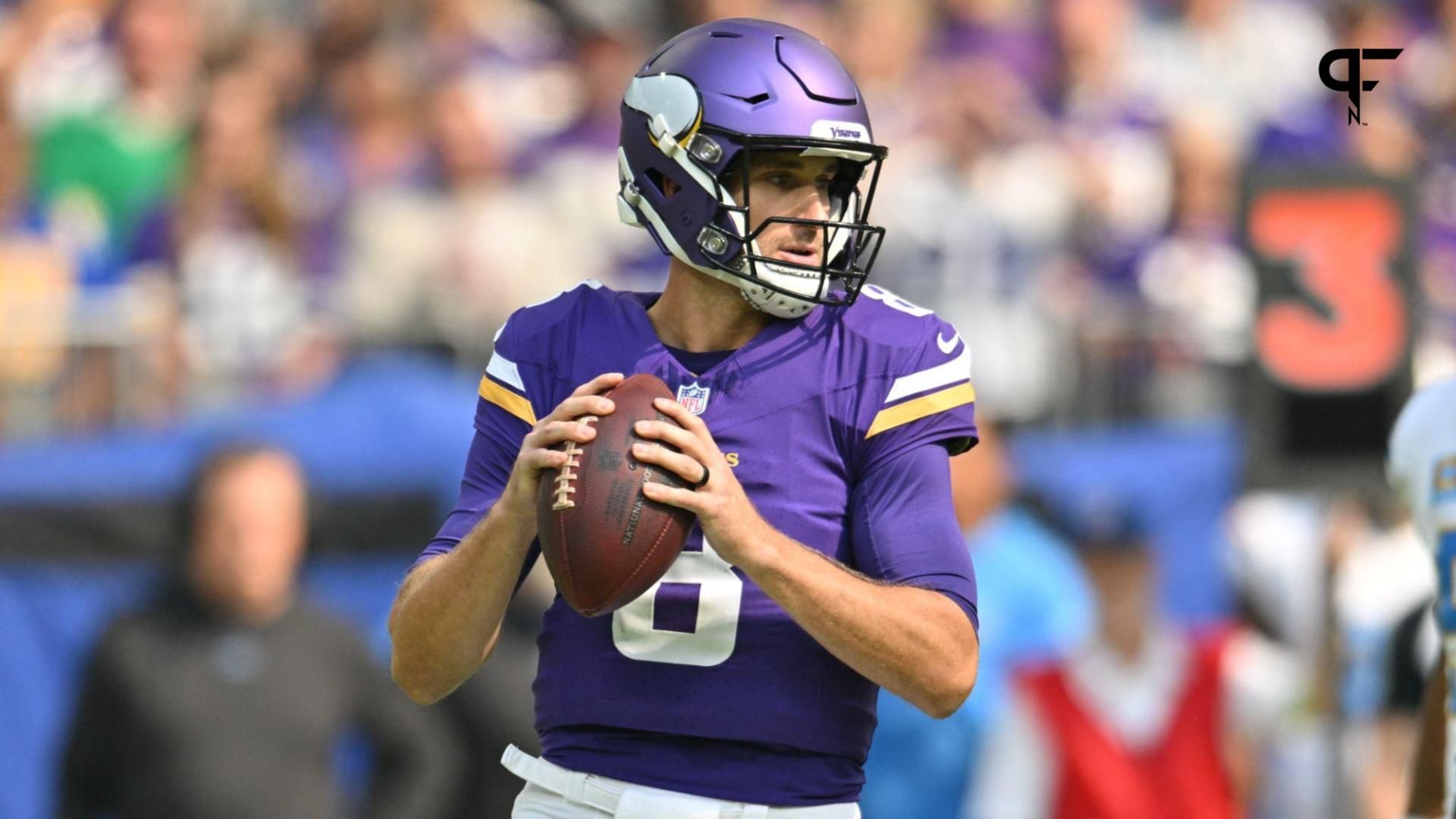 Minnesota Vikings quarterback Kirk Cousins (8) looks to throws a pass against the Los Angeles Chargers during the first quarter at U.S. Bank Stadium.