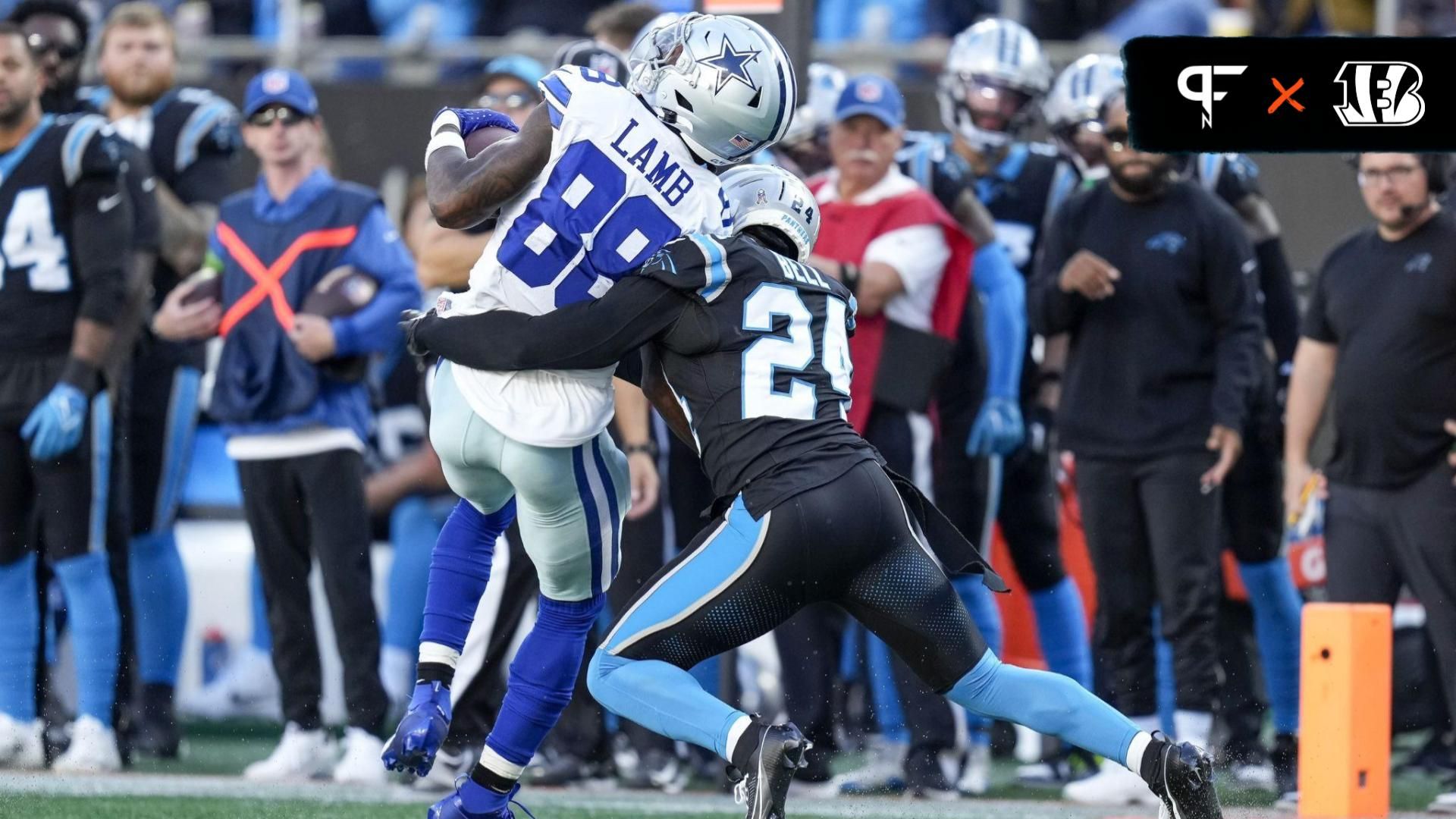 Dallas Cowboys wide receiver CeeDee Lamb (88) is hit as he makes a catch by Carolina Panthers safety Vonn Bell (24) during the second half at Bank of America Stadium.