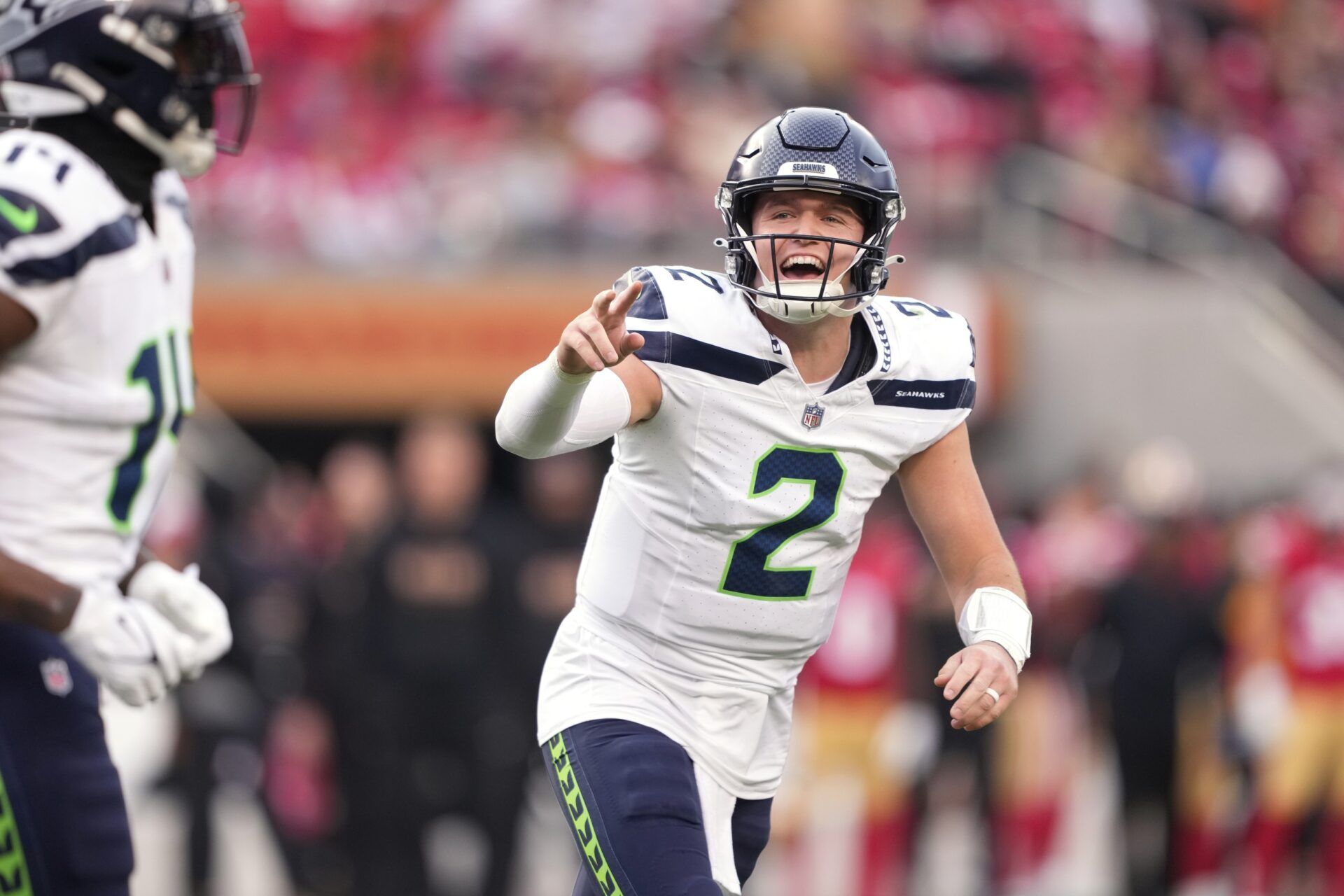 Seattle Seahawks quarterback Drew Lock (2) yells after throwing a touchdown pass against the San Francisco 49ers during the third quarter at Levi's Stadium.