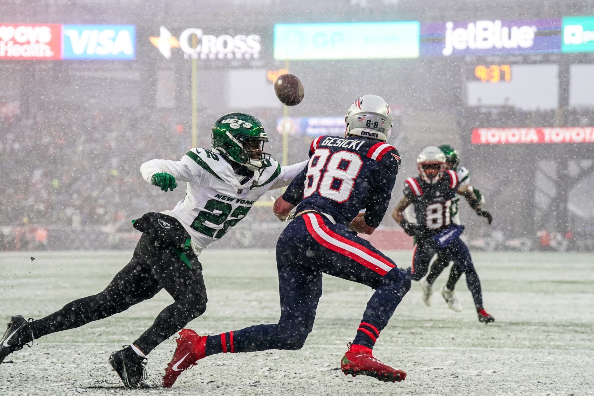 New York Jets safety Tony Adams (22) defends against New England Patriots tight end Mike Gesicki (88) in the first half at Gillette Stadium.