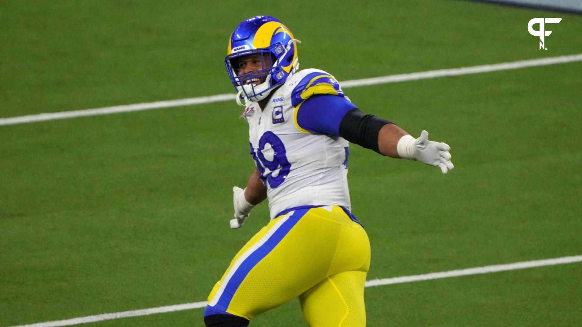 Los Angeles Rams defensive end Aaron Donald (99) celebrates in the fourth quarter against the Cincinnati Bengals in Super Bowl LVI at SoFi Stadium.