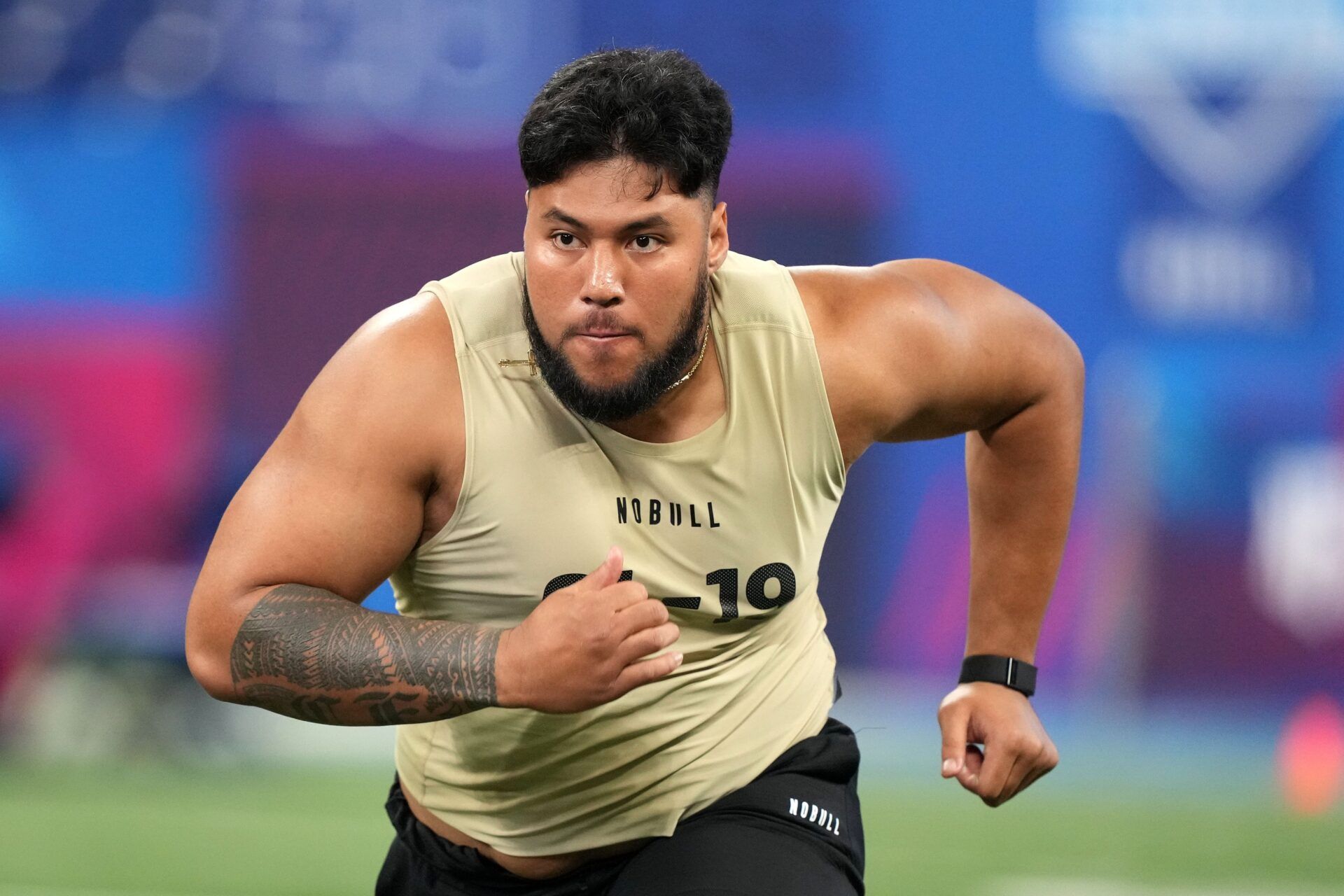 Washington offensive lineman Troy Fautanu (OL19) during the 2024 NFL Combine at Lucas Oil Stadium.