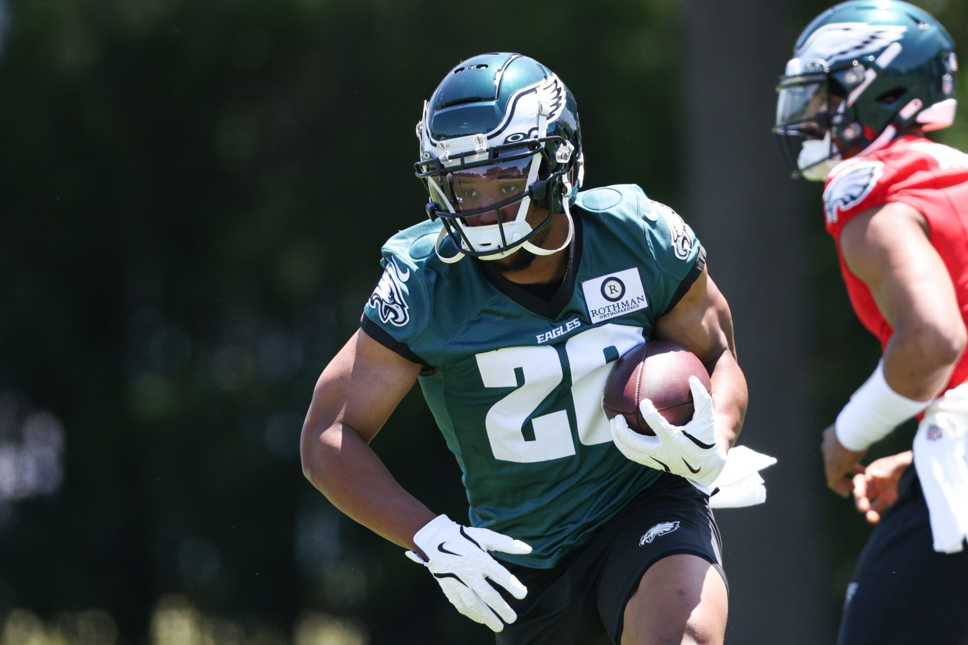 May 30, 2024; Philadelphia, PA, USA; Philadelphia Eagles running back Saquon Barkley (26) runs with the ball during practice at NovaCare Complex. Mandatory Credit: Bill Streicher-USA TODAY Sports