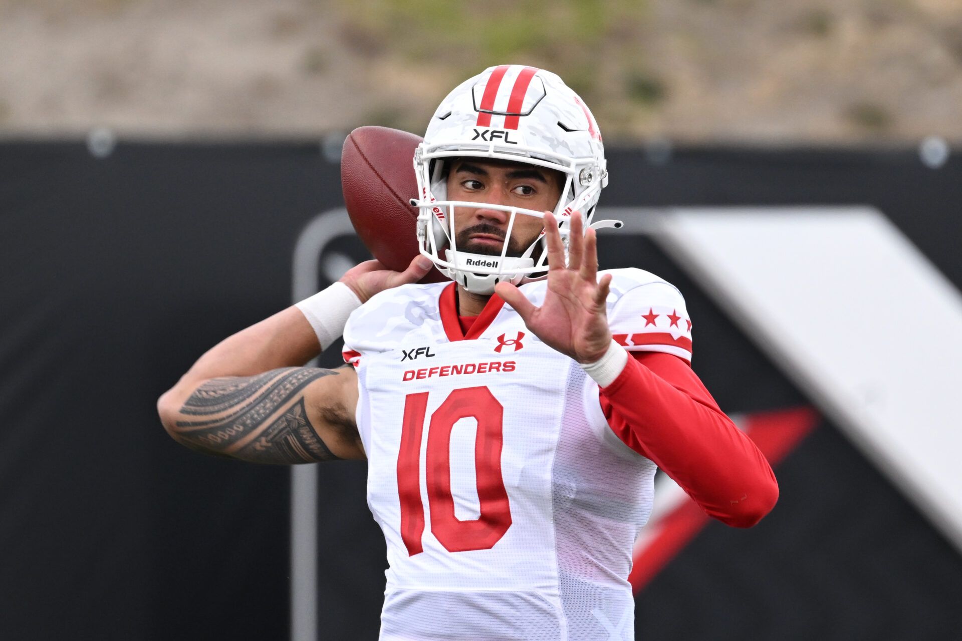 D.C. Defenders quarterback Jordan Ta'amu (10) warms up before the game against the Vegas Vipers at Cashman Field.