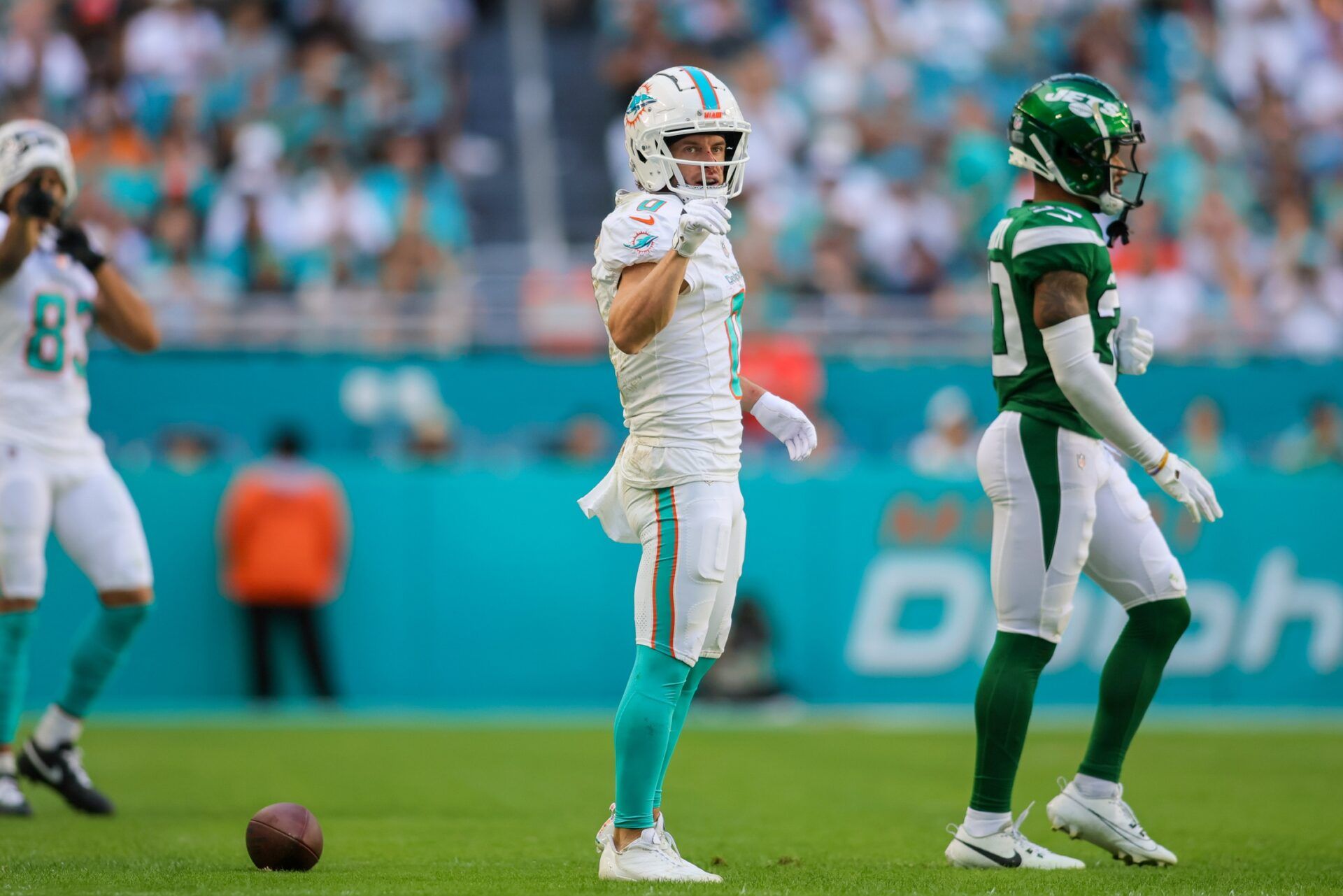 Miami Dolphins wide receiver Braxton Berrios (0) reacts after making a catch against New York Jets cornerback Michael Carter II (30) during the second quarter at Hard Rock Stadium.