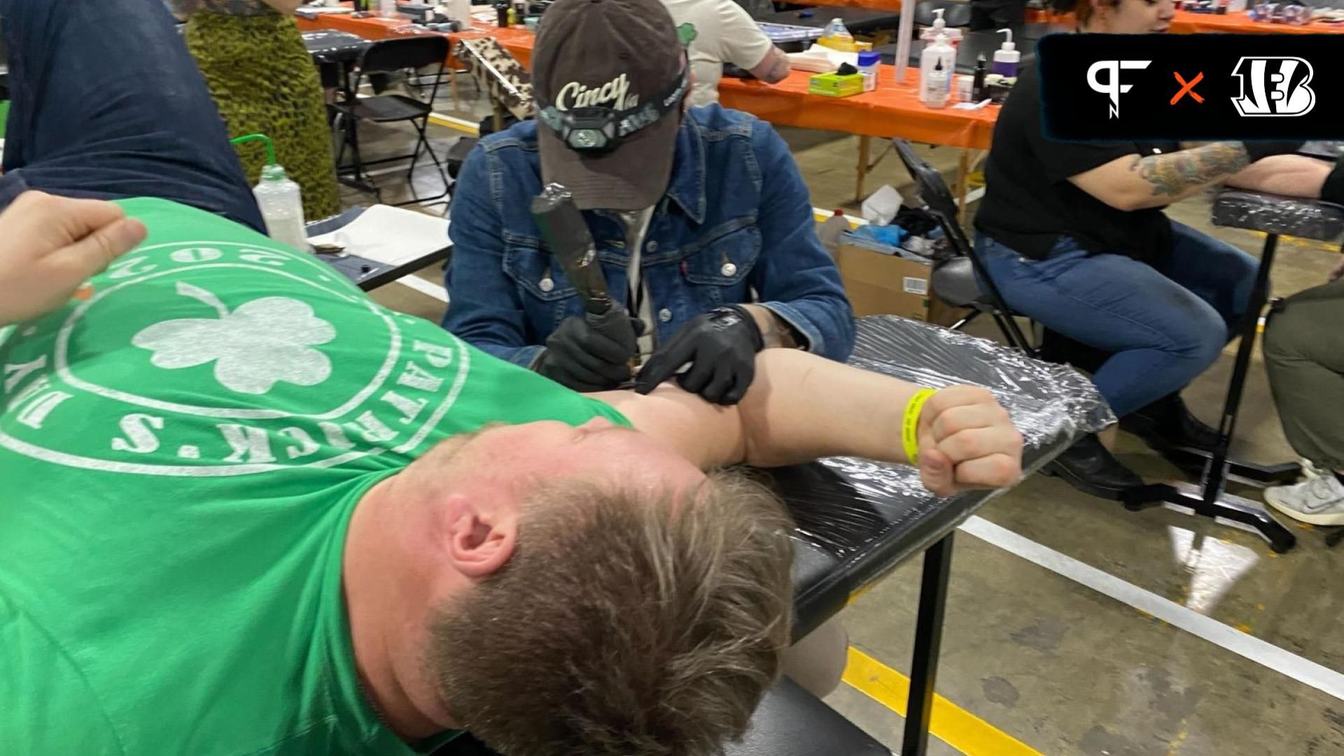 Cincinnati Bengals chief of coaching staff Doug Rosfeld was one of nearly 500 people who received a “Cincy” tattoo as part of center Ted Karras' St. Tatty’s Day event Sunday to thank fans for helping him win the Walter Payton Man of the Year Charity Challenge.