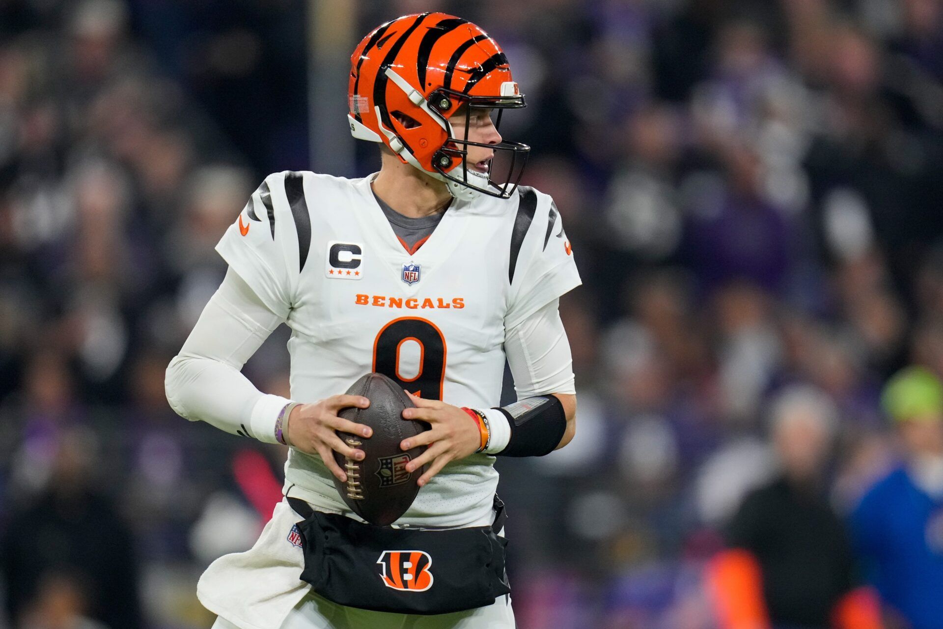 Cincinnati Bengals quarterback Joe Burrow (9) drops back in the pocket in the first quarter of the NFL Week 11 game between the Baltimore Ravens and the Cincinnati Bengals at M&T Bank Stadium in Baltimore on Thursday, Nov. 16, 2023.