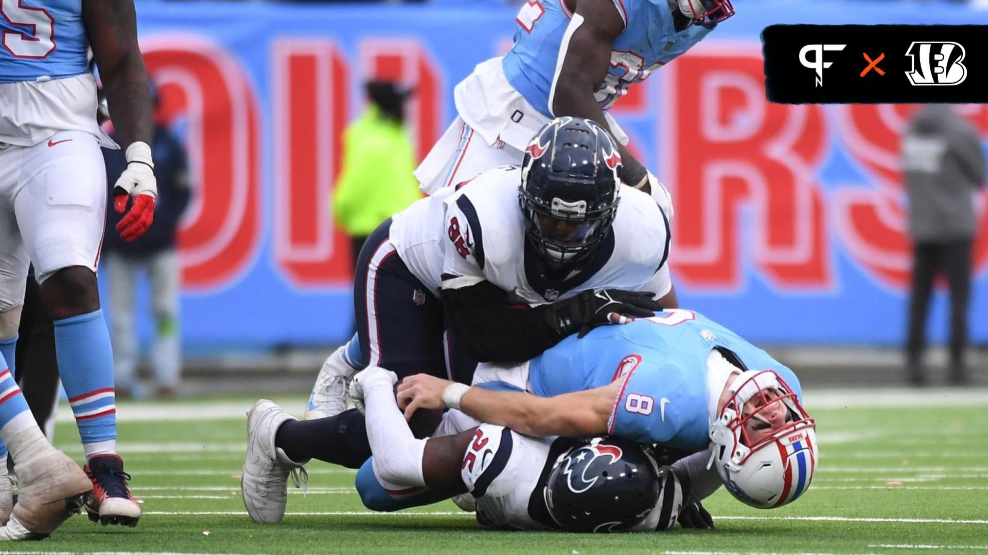 Tennessee Titans quarterback Will Levis (8) is injured after being sacked by Houston Texans cornerback Desmond King II (25) defensive tackle Sheldon Rankins (98) in overtime at Nissan Stadium.