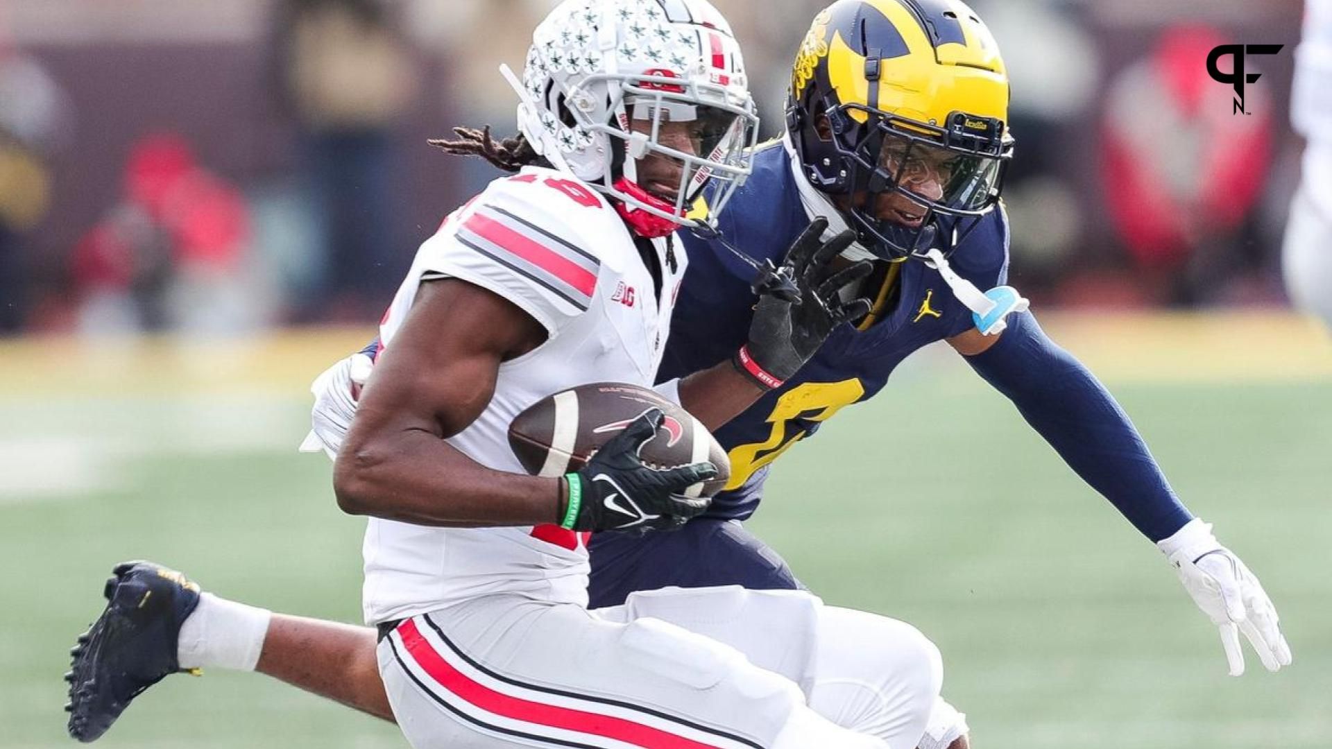 Michigan defensive back Will Johnson defends Ohio State receiver Marvin Harrison Jr. during the second half at Michigan Stadium in Ann Arbor on Saturday, Nov. 25, 2023