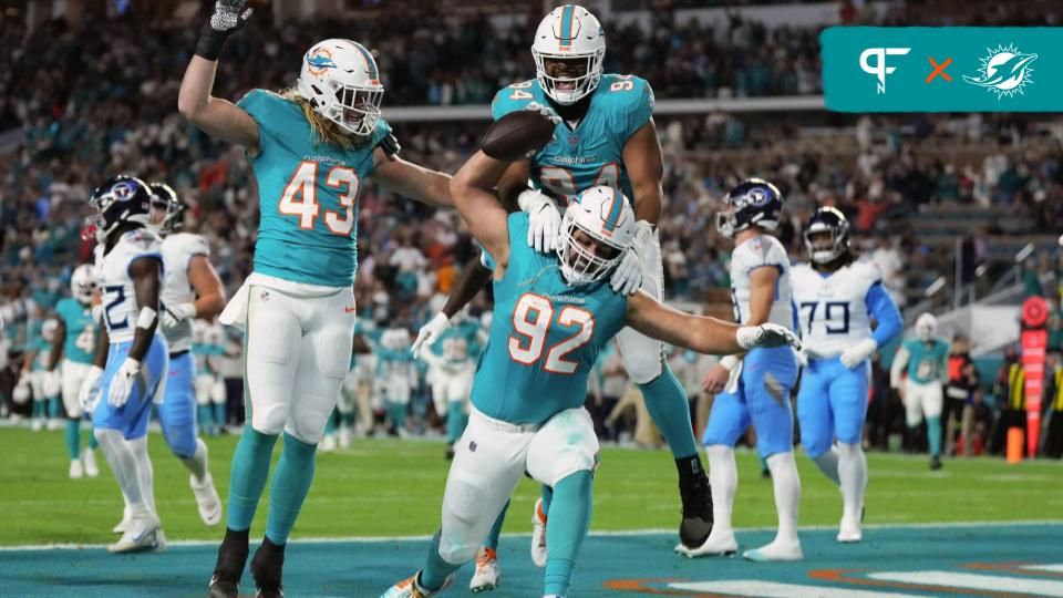 Miami Dolphins defensive tackle Zach Sieler (92) celebrates his touchdown after intercepting a pass from Tennessee Titans quarterback Will Levis (not pictured) during the first half at Hard Rock Stadium.