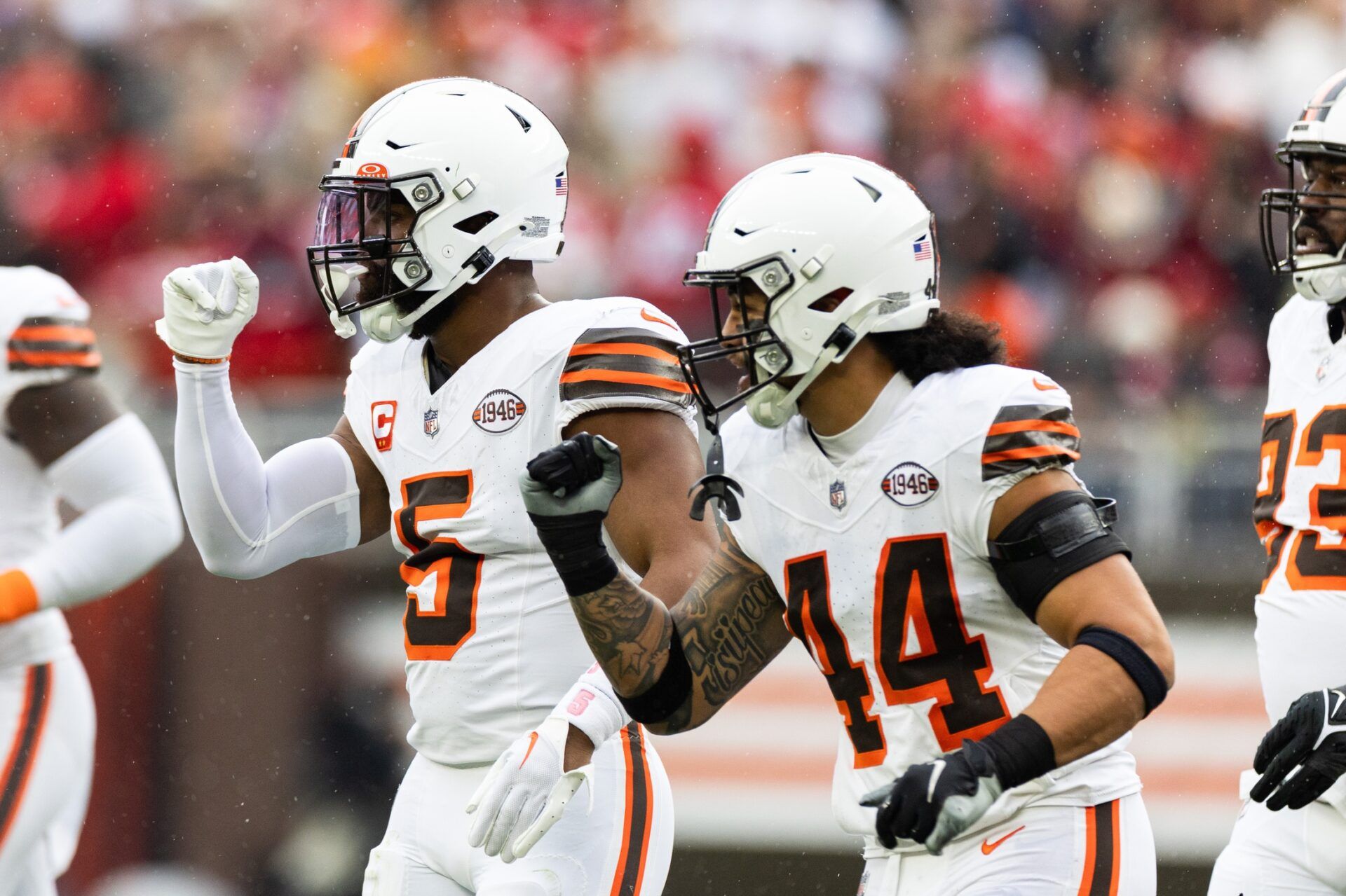 Cleveland Browns linebacker Anthony Walker Jr. (5) and linebacker Sione Takitaki (44) celebrate a missed field goal by the San Francisco 49ers during the first quarter at Cleveland Browns Stadium.