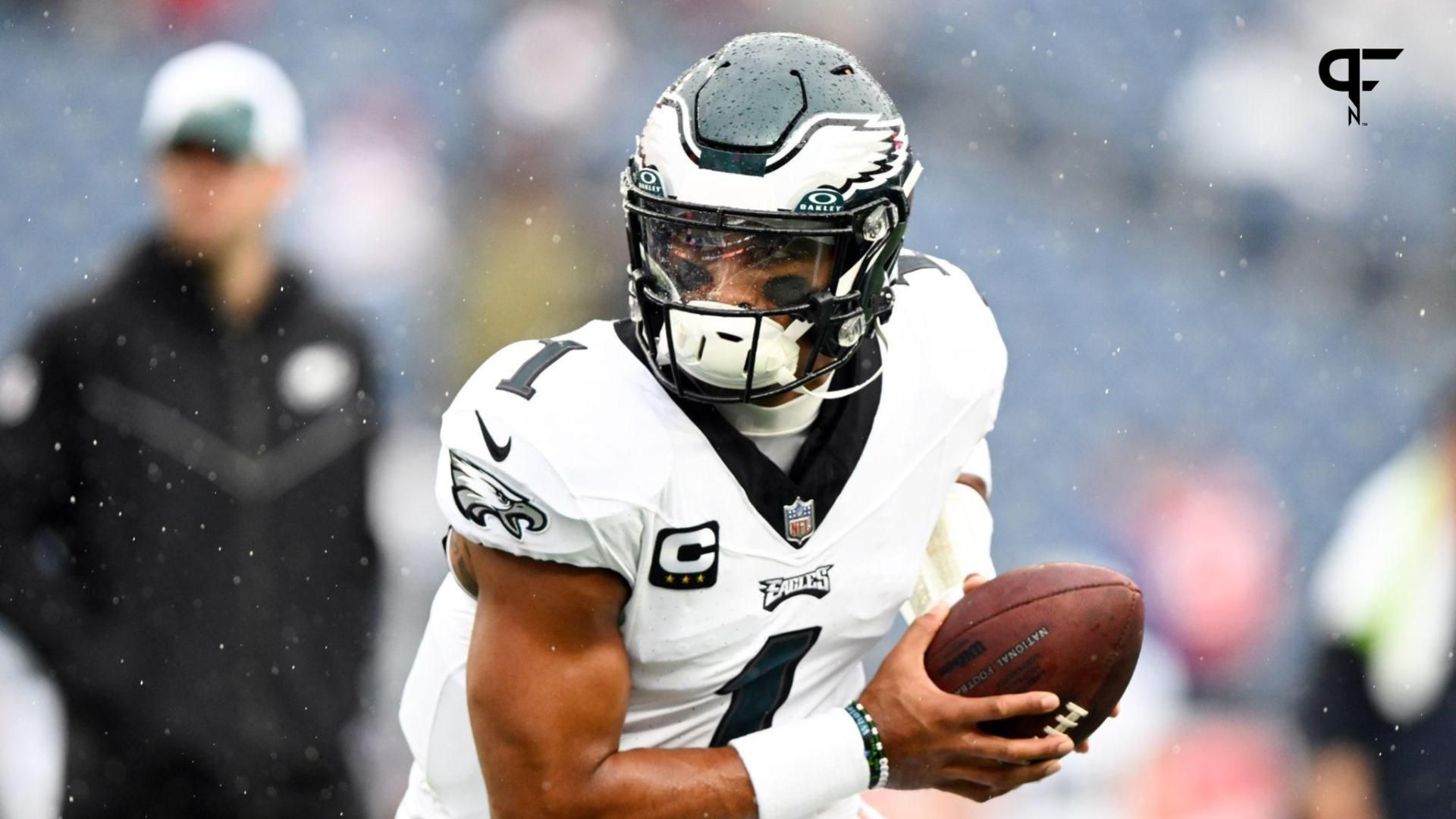 Philadelphia Eagles quarterback Jalen Hurts (1) warms up before a game against the New England Patriots at Gillette Stadium.