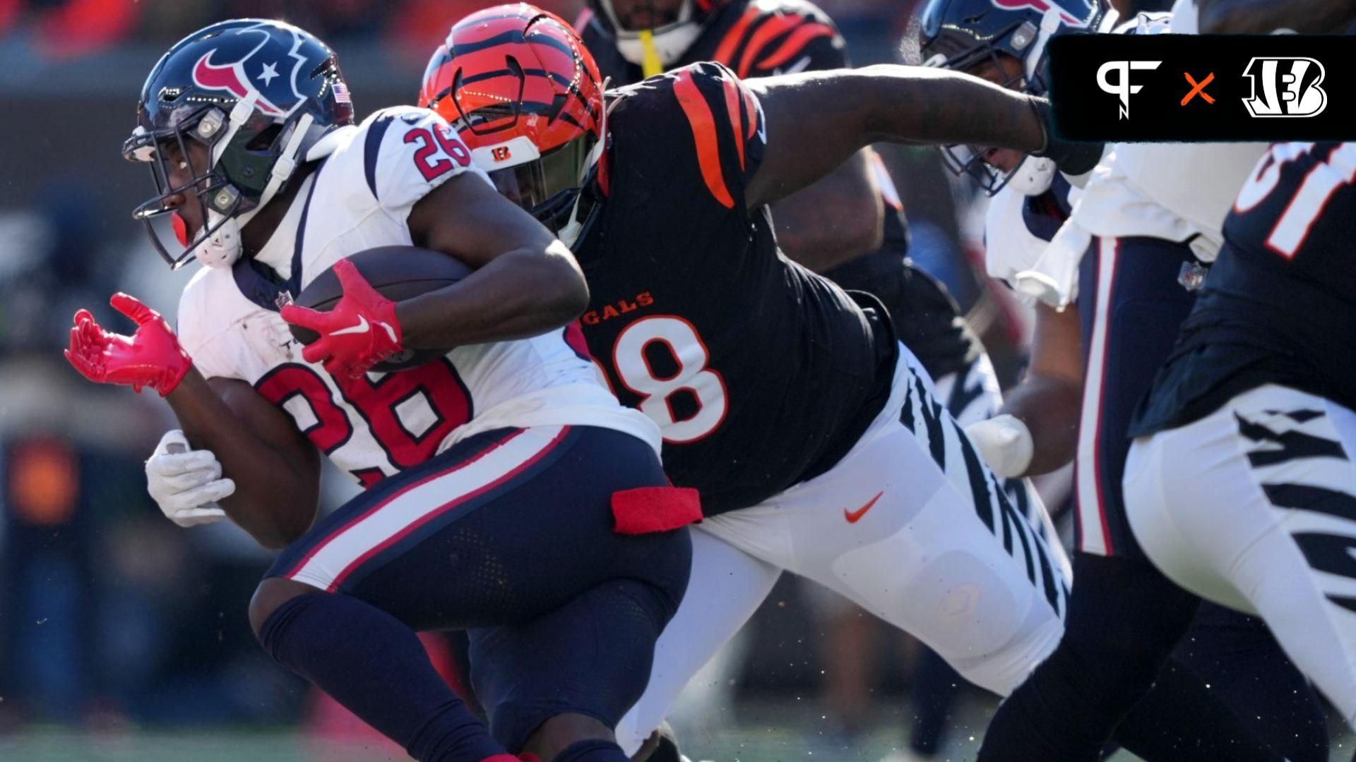 Cincinnati Bengals defensive tackle DJ Reader (98) tracker and tackled Houston Texans running back Devin Singletary (26) in the first quarter of a Week 10 NFL football game between the Houston Texans and the Cincinnati Bengals at Paycor Stadium.