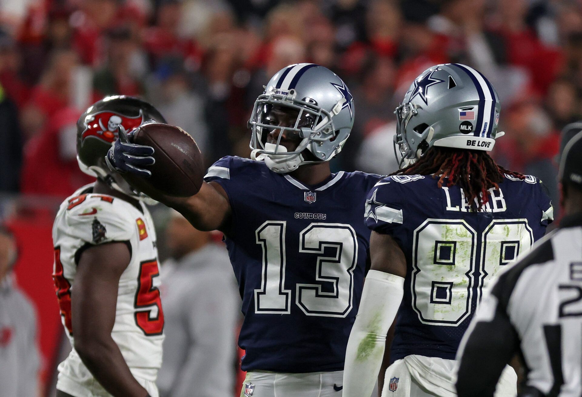 Dallas Cowboys wide receiver Michael Gallup (13) reacts after a catch against the Tampa Bay Buccaneers in the second half during the wild card game at Raymond James Stadium.