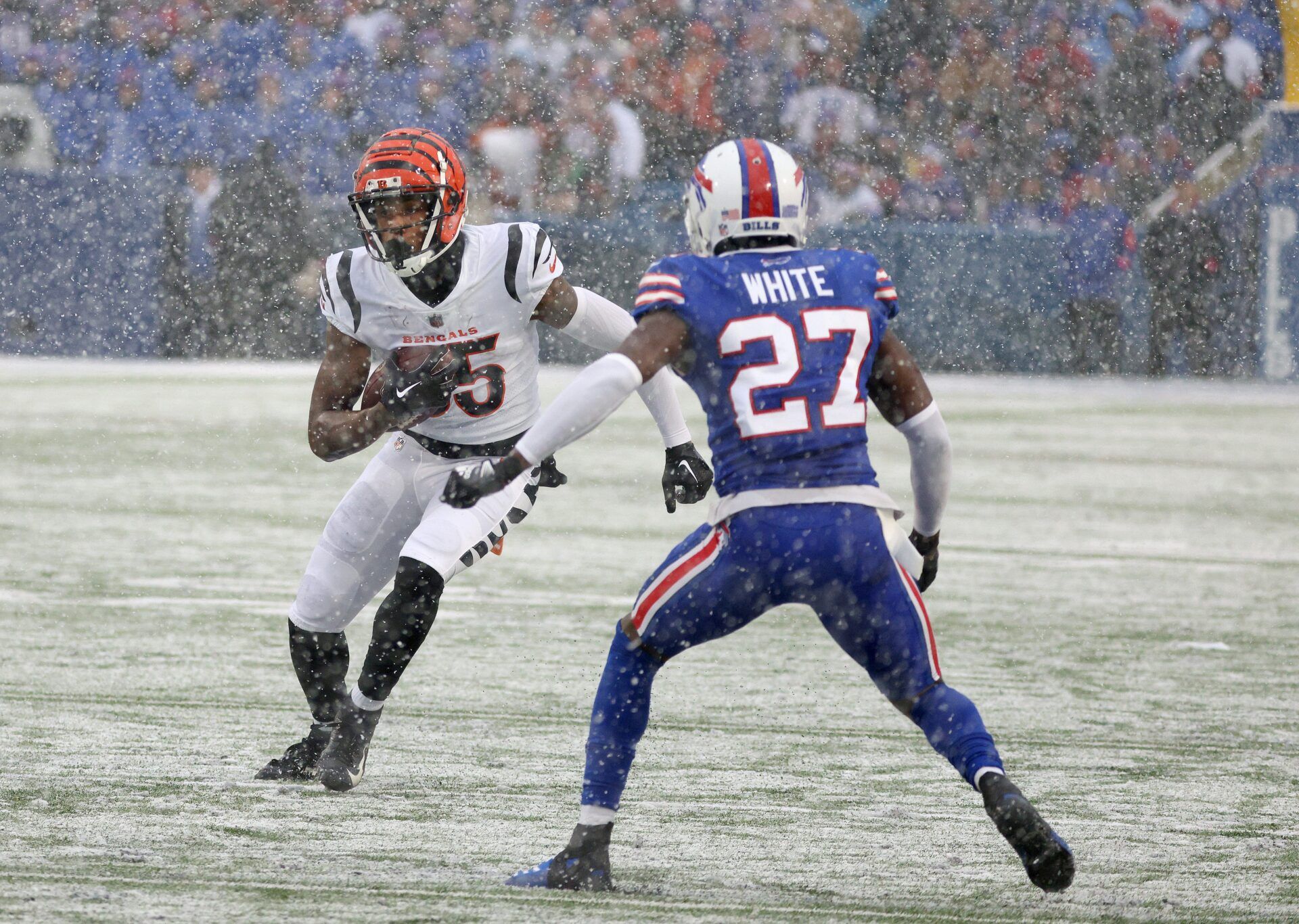 Bengals Receiver Tee Higgins looks for yards against Bills cornerback Tre’Davious White.