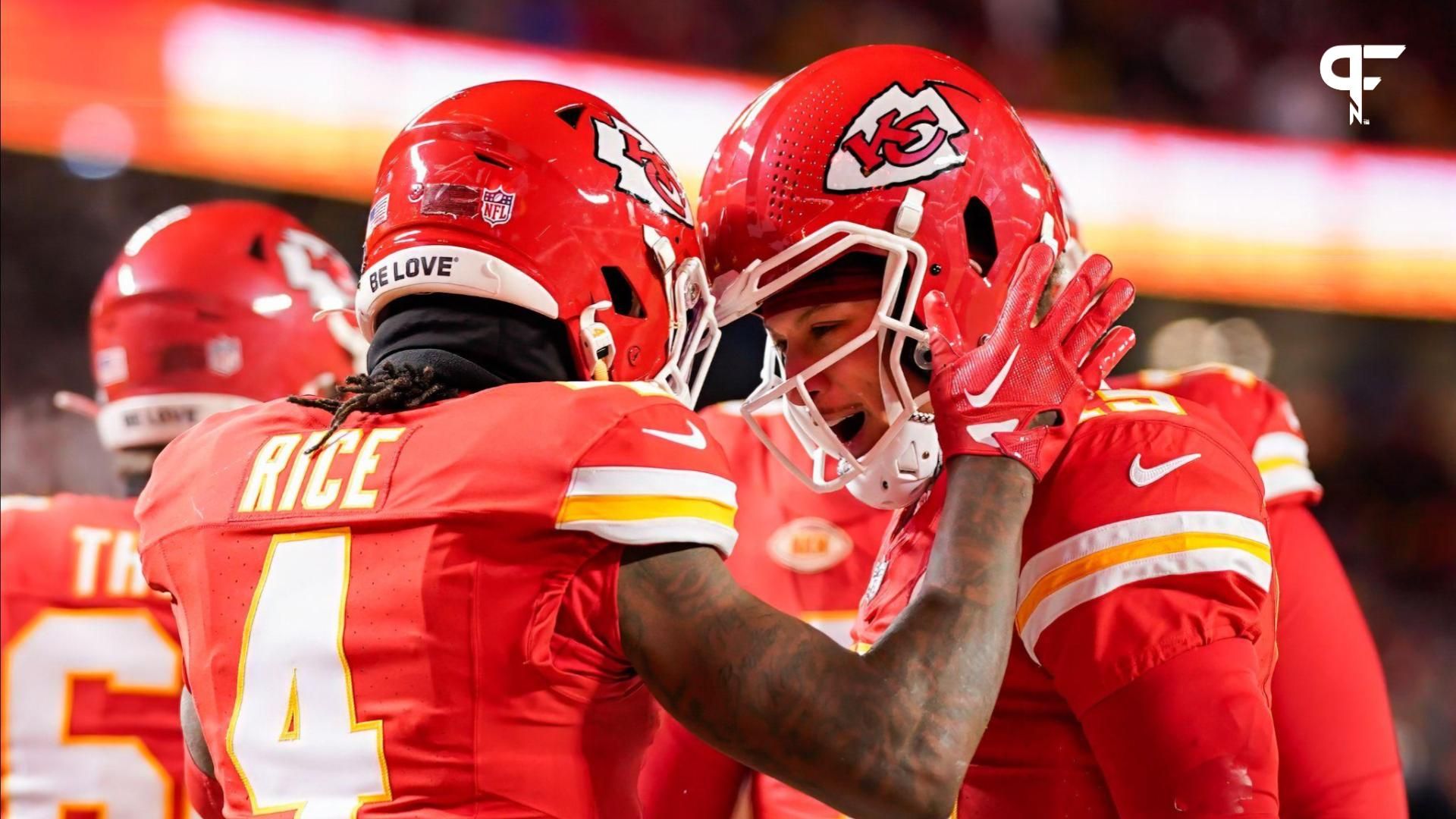 Kansas City Chiefs quarterback Patrick Mahomes (15) celebrates with wide receiver Rashee Rice (4) during the first half of a 2024 AFC wild card game against the Miami Dolphins at GEHA Field at Arrowhead Stadium.