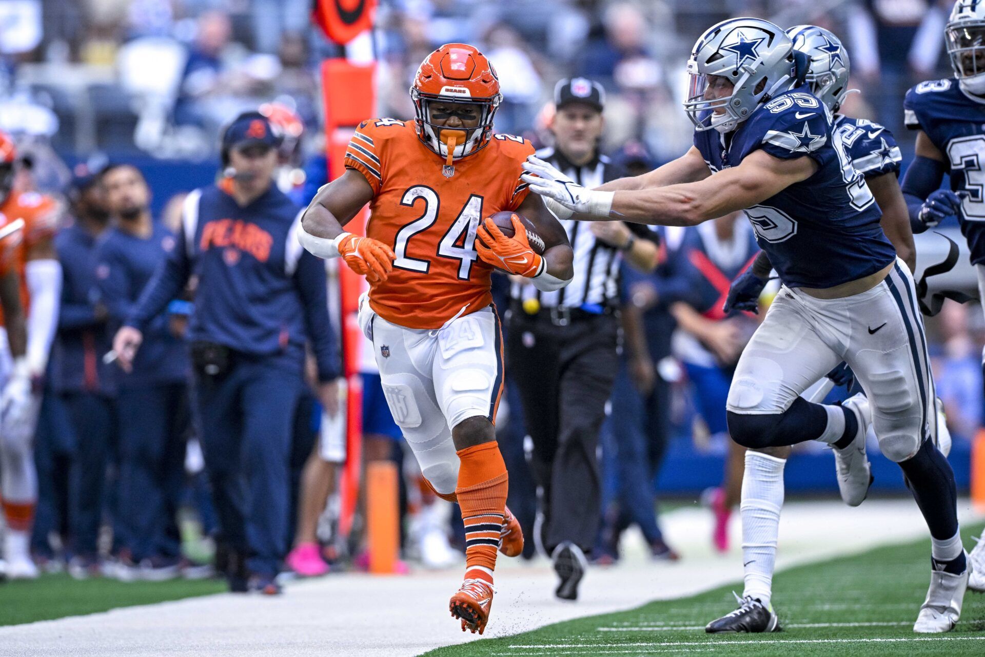 Oct 30, 2022; Arlington, Texas, USA; Chicago Bears running back Khalil Herbert (24) is pushed out of bounds by Dallas Cowboys linebacker Leighton Vander Esch (55) after he gains a Chicago first down during the second half at AT&T Stadium. Mandatory Credit: Jerome Miron-USA TODAY Sports