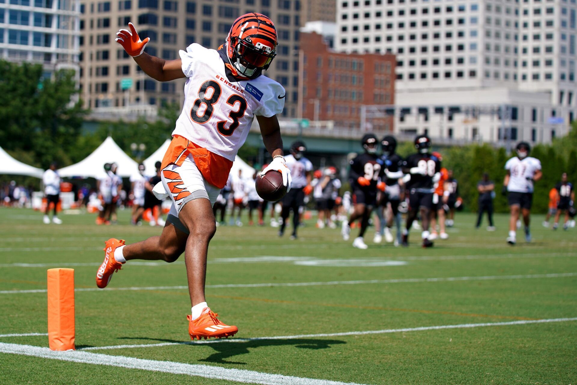 Cincinnati Bengals WR Tyler Boyd (83) scores a touchdown during training camp.