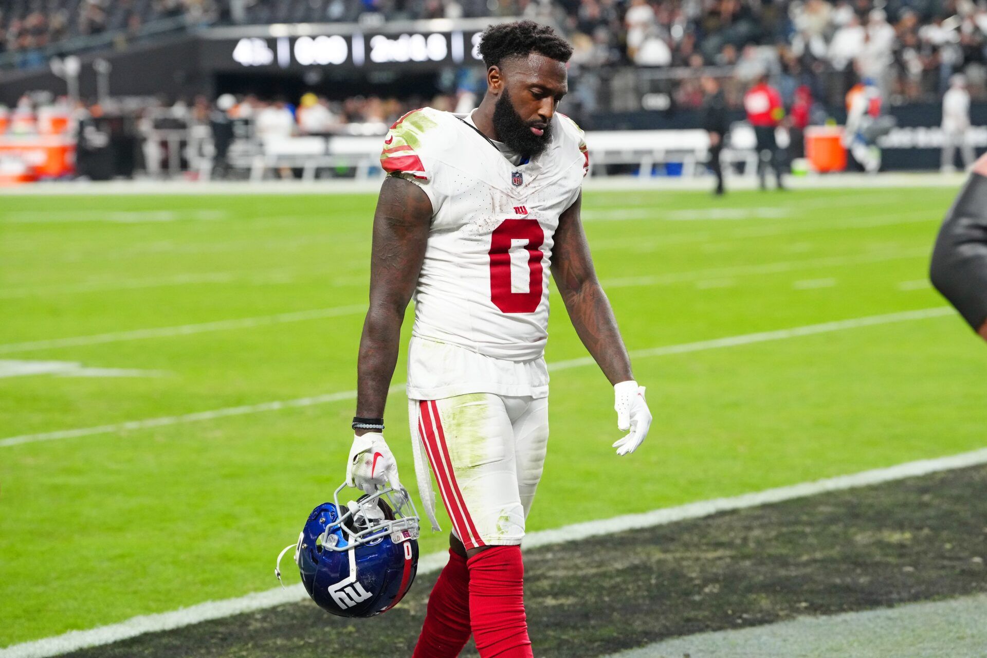 New York Giants wide receiver Parris Campbell (0) walks off the field after the Las Vegas Raiders defeated the Giants 30-6 at Allegiant Stadium.