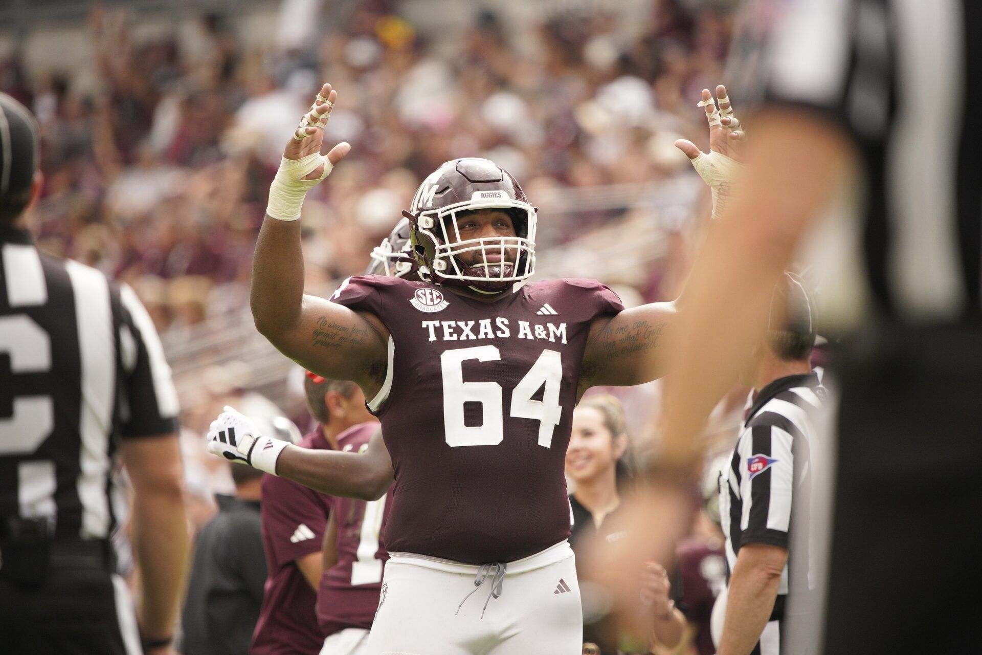 Texas A&M Aggies offensive lineman Layden Robinson (64) celebrates a team touchdown during the second half in a game against South Carolina Gamecocks at Kyle Field.